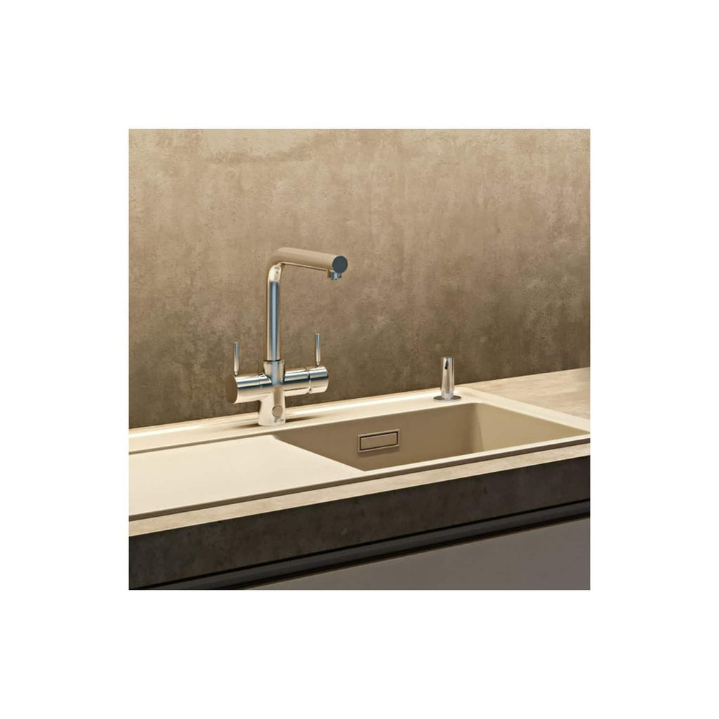 Sleek modern kitchen sink with chrome mixer tap and side soap dispenser set against a minimalist beige textured wall. Perfect for contemporary bathroom or kitchen designs.
