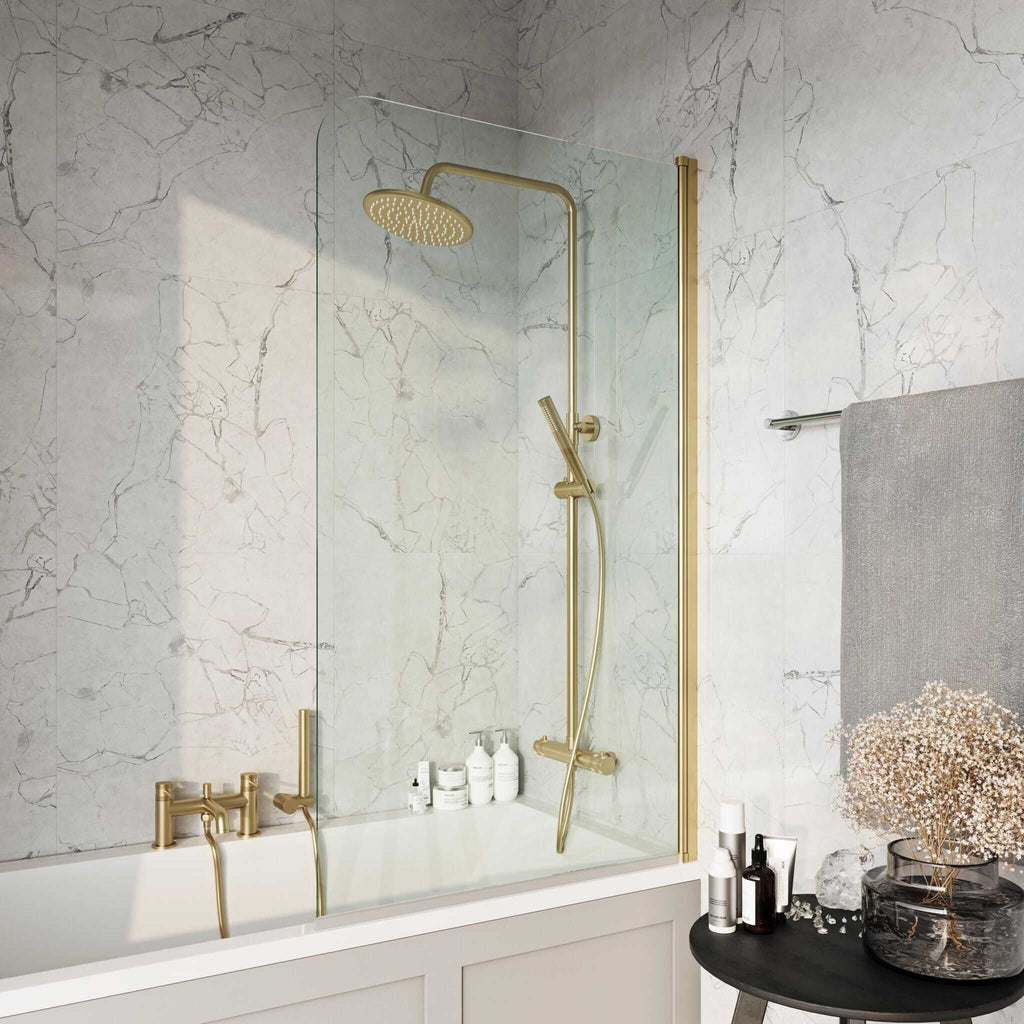 Elegant walk-in shower with gold fixtures and marble wall tiles, creating a luxurious bathroom aesthetic. Perfect for modern bathroom renovations and stylish shower upgrade ideas.