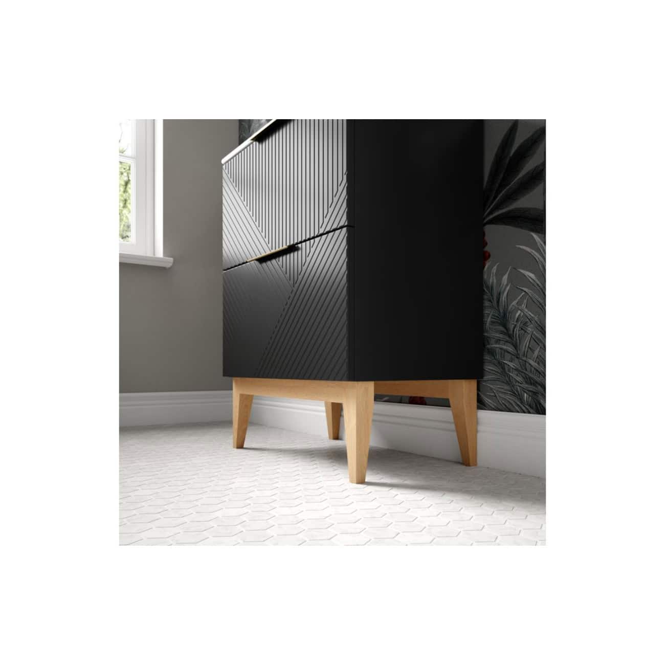 Sleek black modern cabinet with wooden legs in stylish bathroom interior, designed for bathroom storage and organisation.