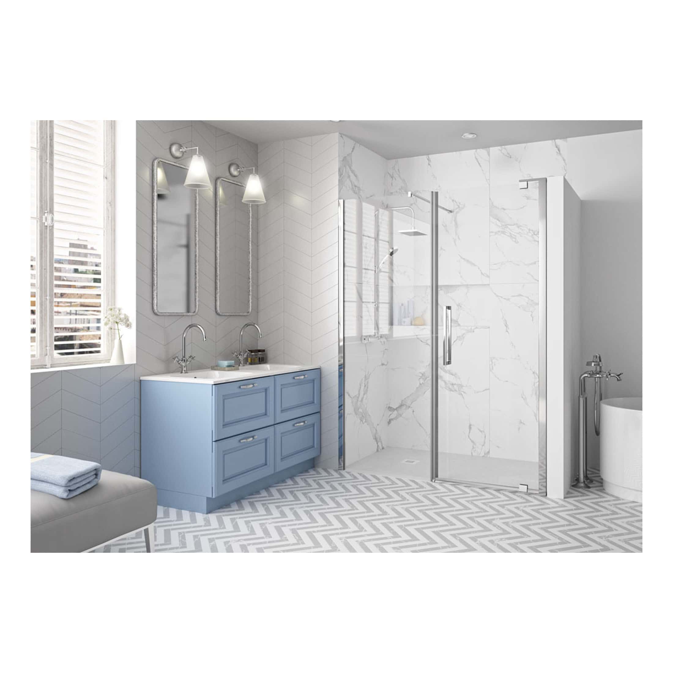 Modern bathroom with a blue vanity, marble shower enclosure, and stylish wall-mounted mirrors, featuring elegant lighting and patterned floor tiles for a contemporary and luxurious look.