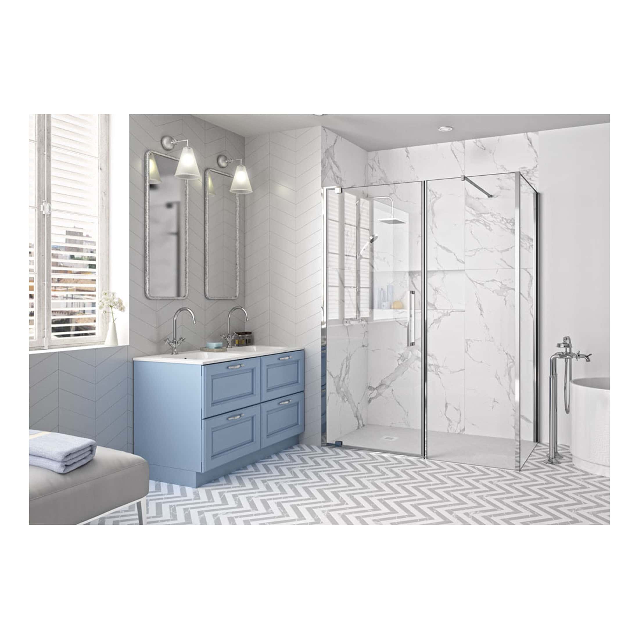 Modern bathroom with blue vanity, marble accents, walk-in shower with glass enclosure, and elegant lighting, showcasing high-end bathroom design and fixtures.