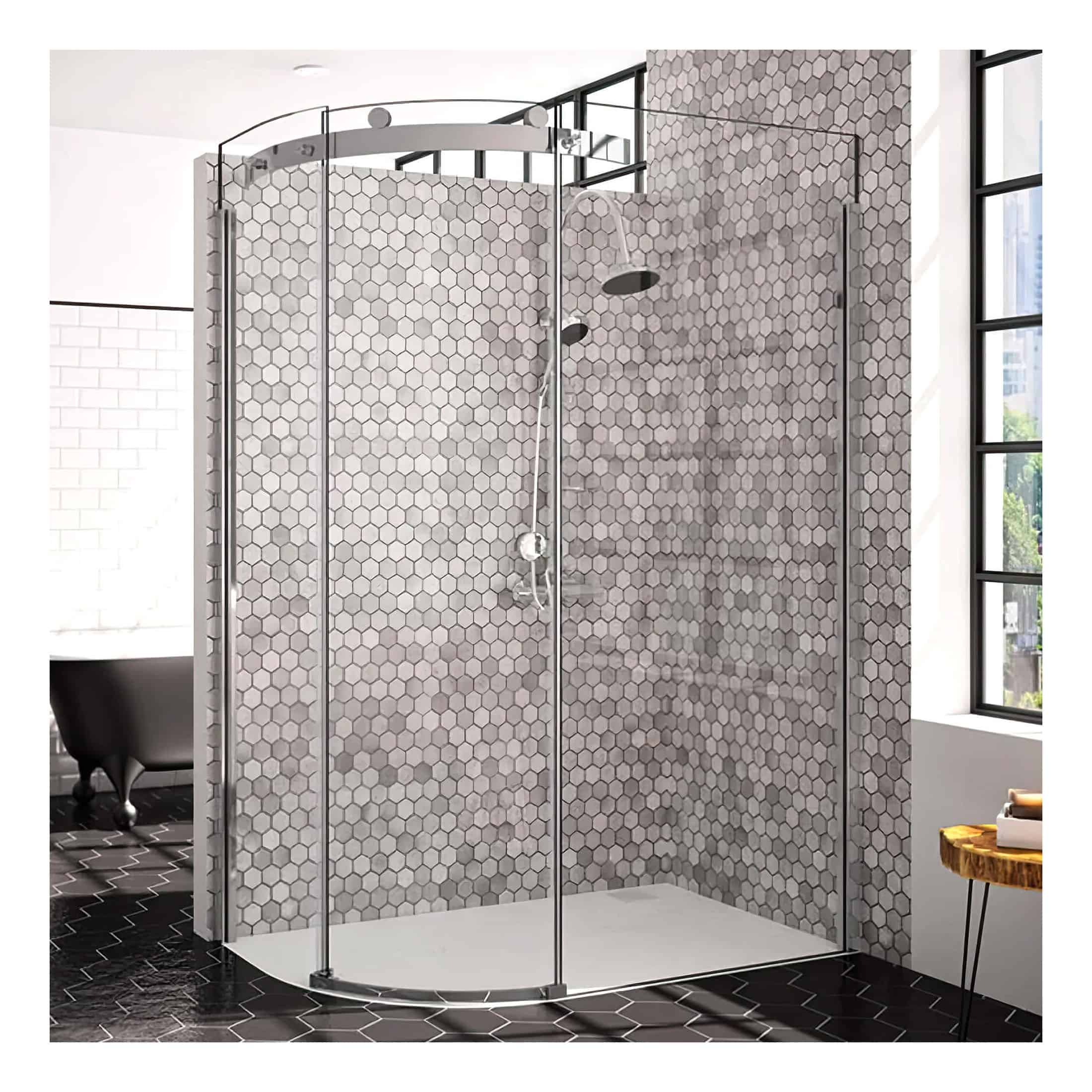 Shower enclosure with curved glass doors and hexagonal grey tile wall, modern bathroom design by Bubly Bathrooms.