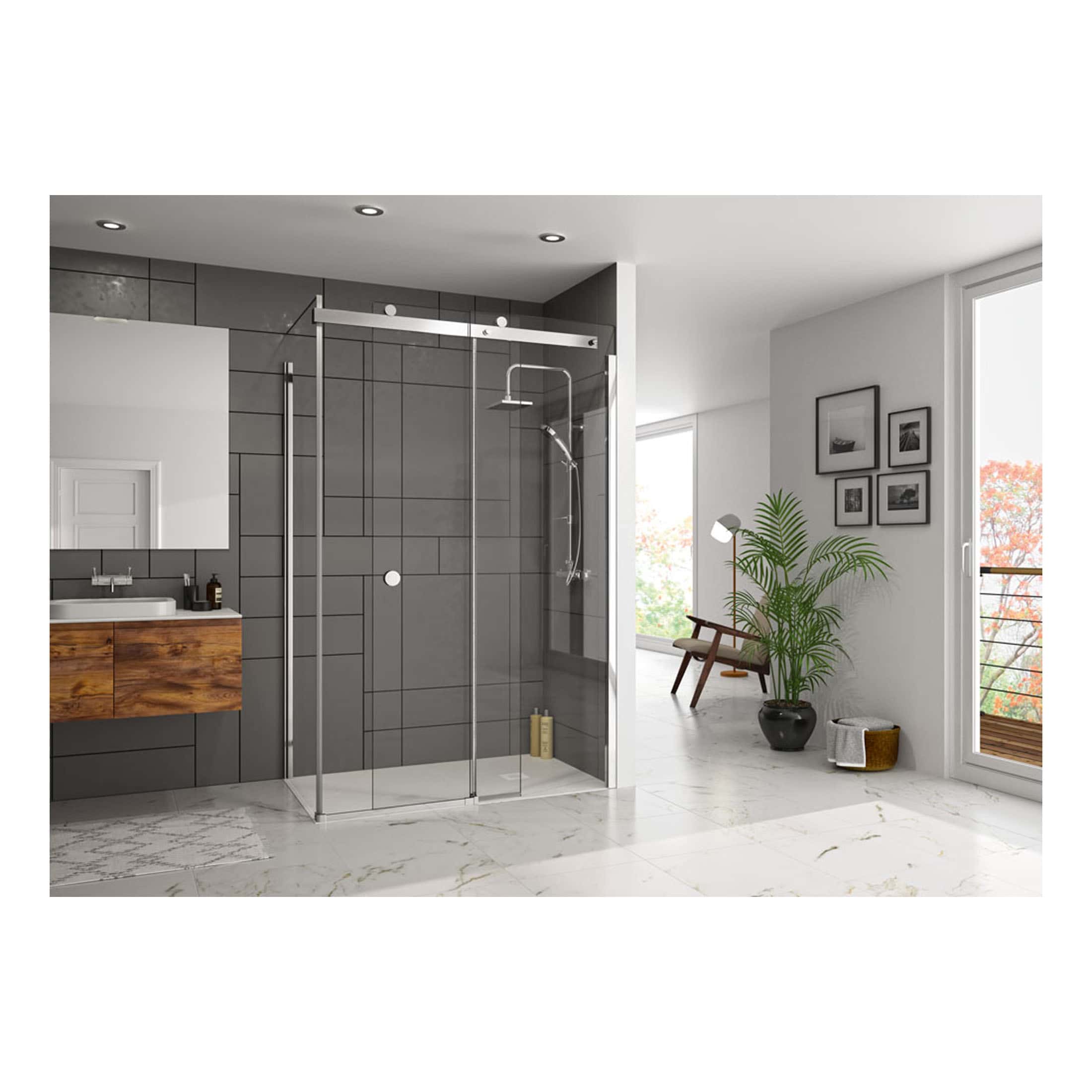 Sleek modern bathroom featuring a glass shower enclosure with rainfall showerhead, minimalist wooden vanity, stylish black-and-white framed photos, lush green potted plant, and large windows allowing natural light.