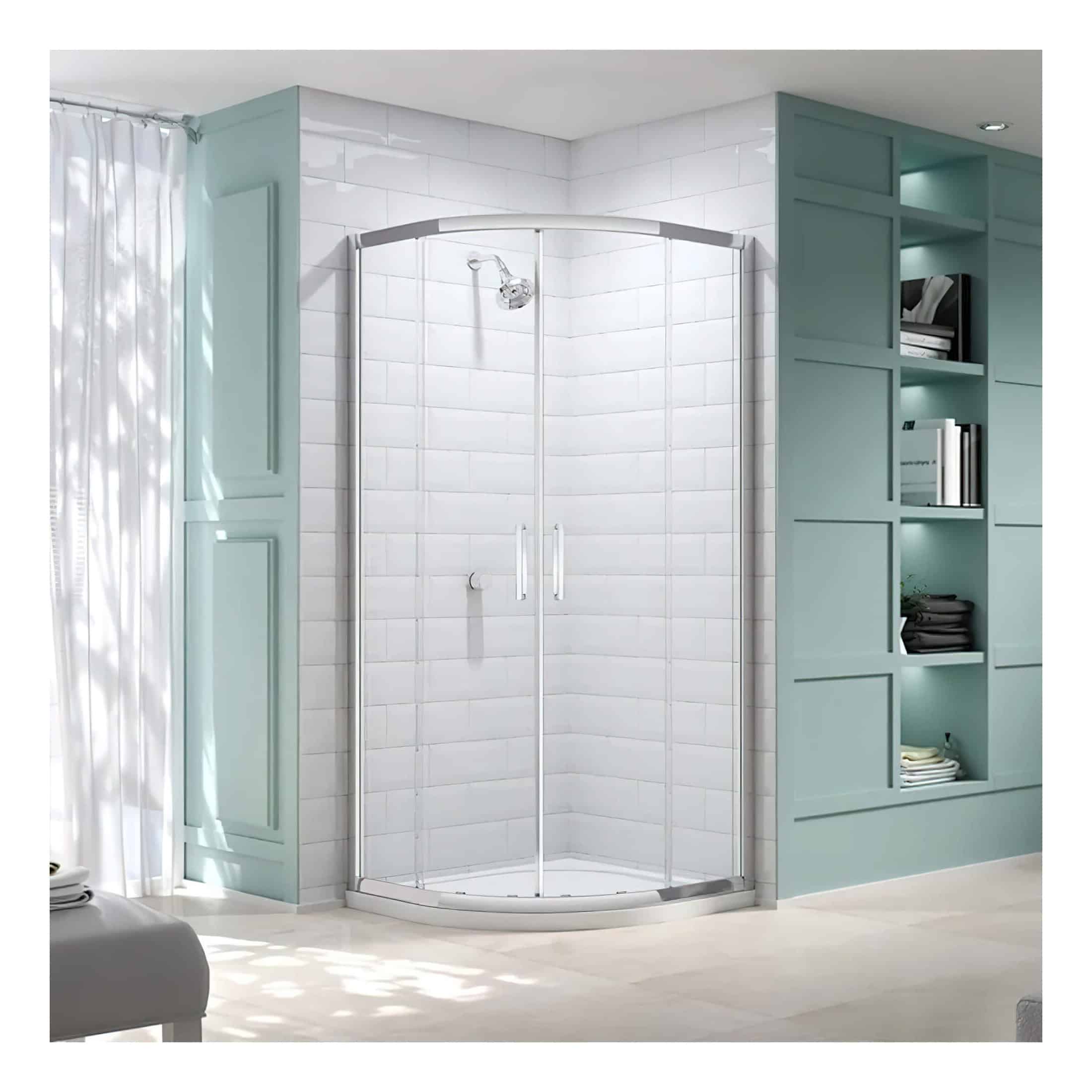 Shower enclosure with curved glass doors in a modern bathroom with white tiled walls and teal cabinetry, creating a stylish and functional space.