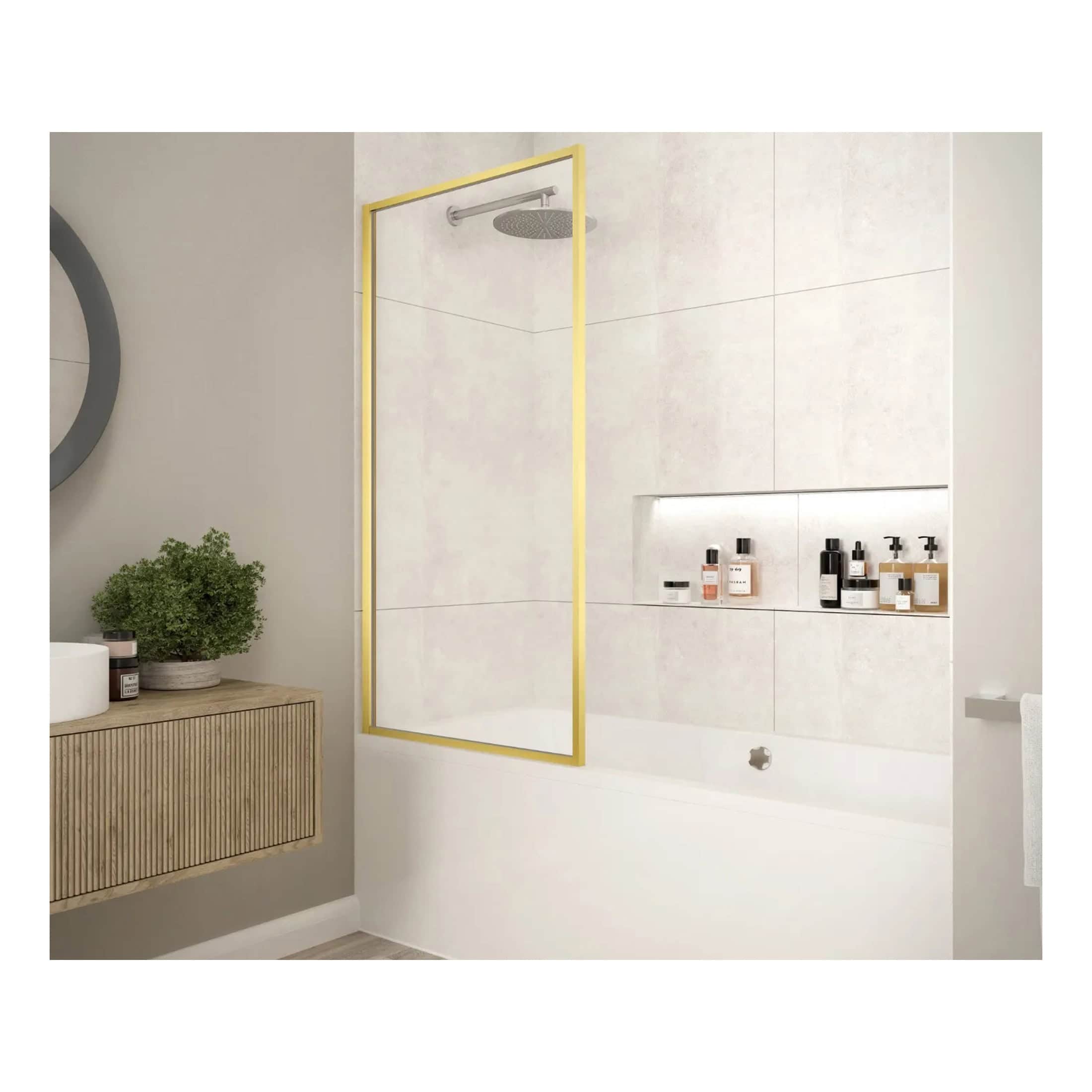 Sleek modern bathroom shower area with glass panel framed in gold, minimalist design, neutral wall tones, built-in niche with toiletries, and a vanity with storage cabinet for contemporary bathroom decor.