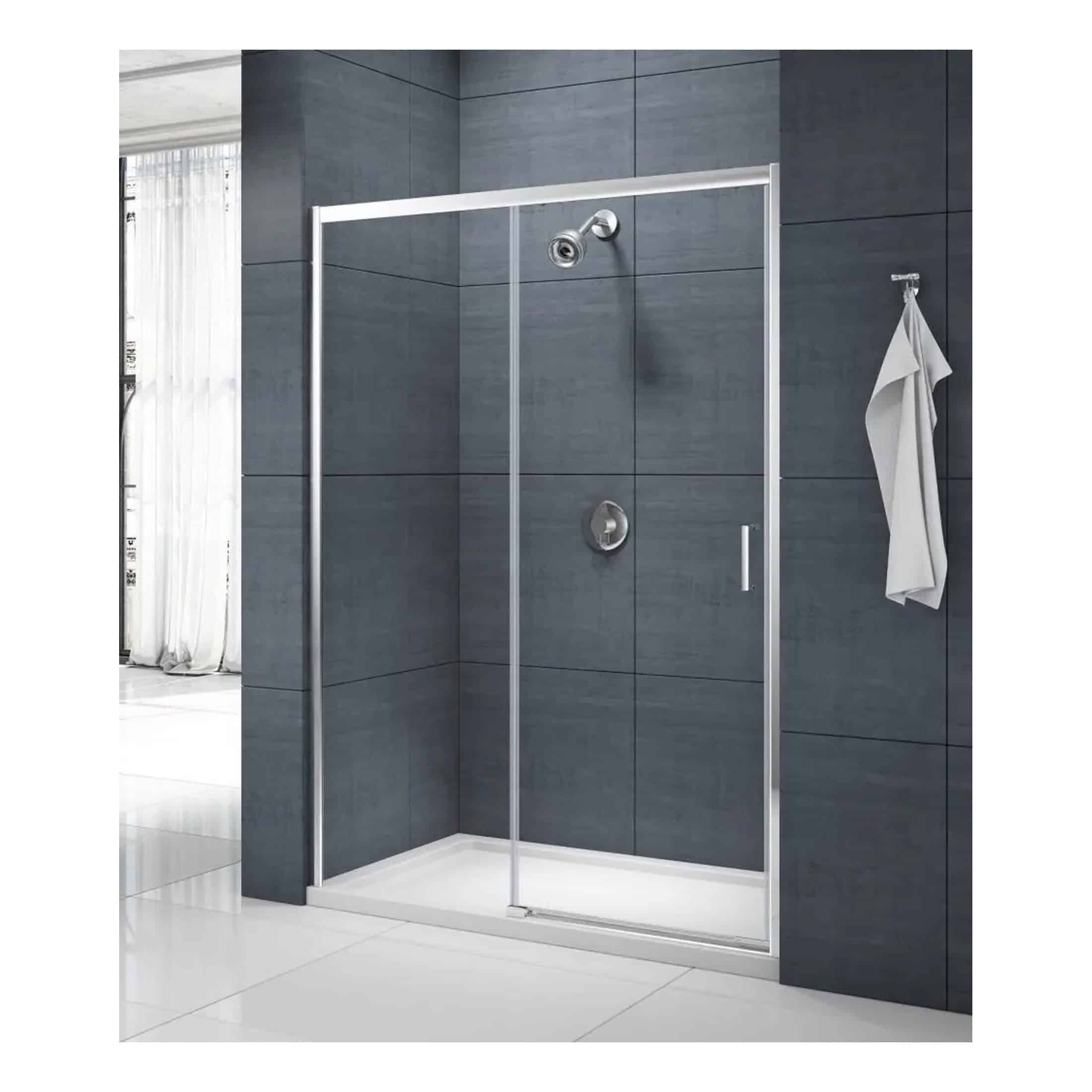 Sleek glass shower enclosure with modern chrome frame in a contemporary bathroom with dark tiled walls and white flooring.