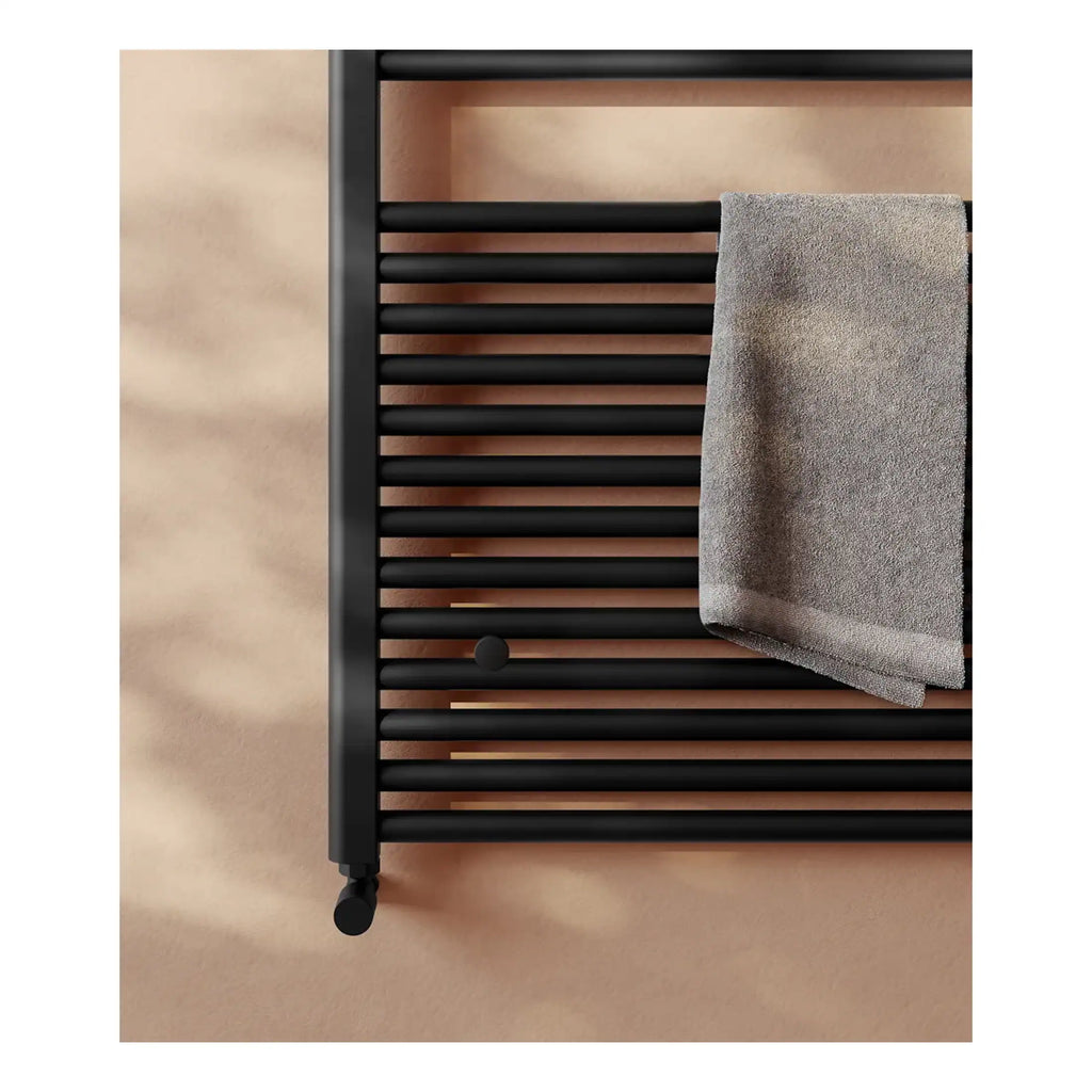 Black heated towel rail with wooden accents, ideal for modern bathrooms, providing warmth and storage space for towels. Stylish and functional design for bathroom comfort.