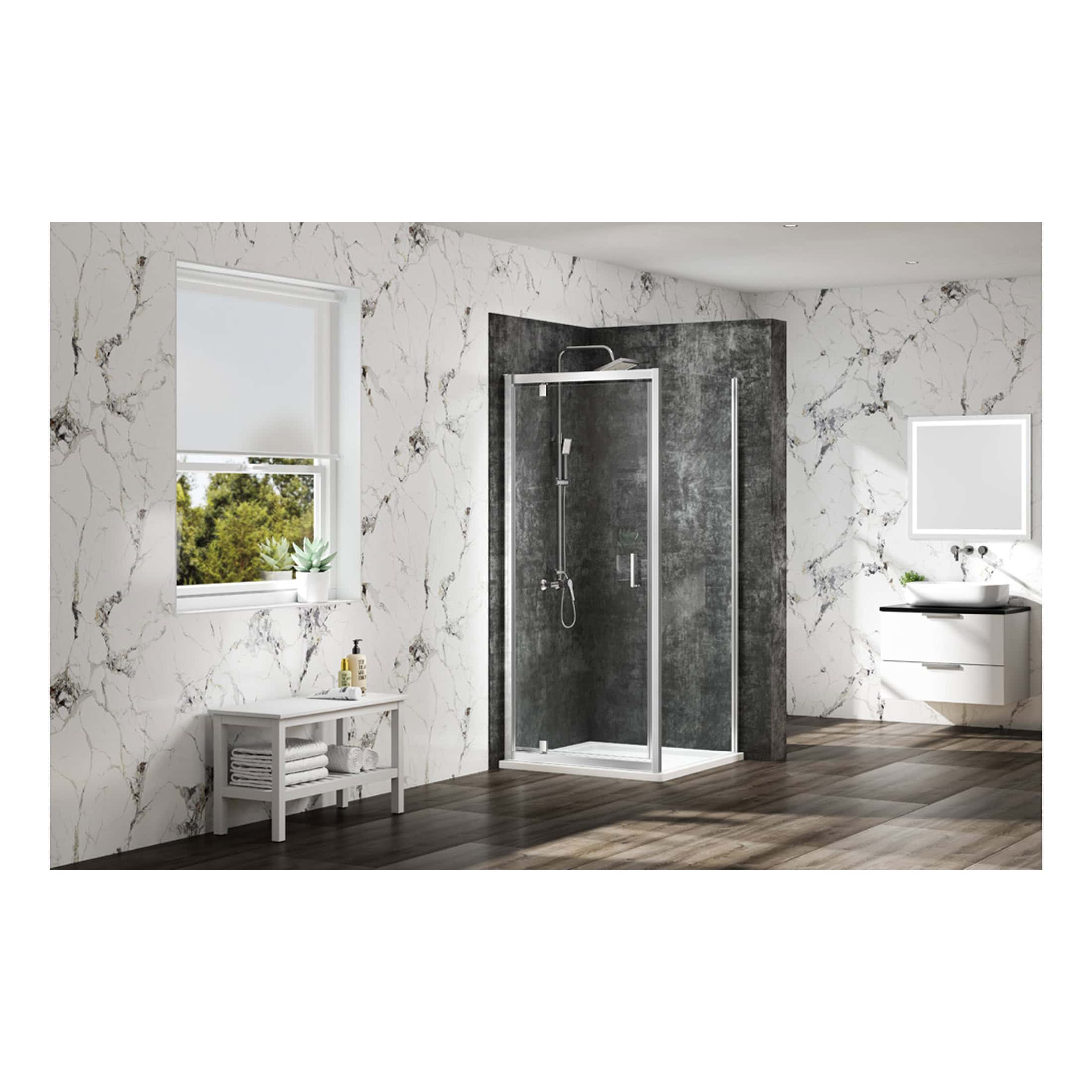 Luxurious modern bathroom with marble wall tiles, a sleek glass shower enclosure, and contemporary white vanity with a round basin sink, creating an elegant and stylish space.