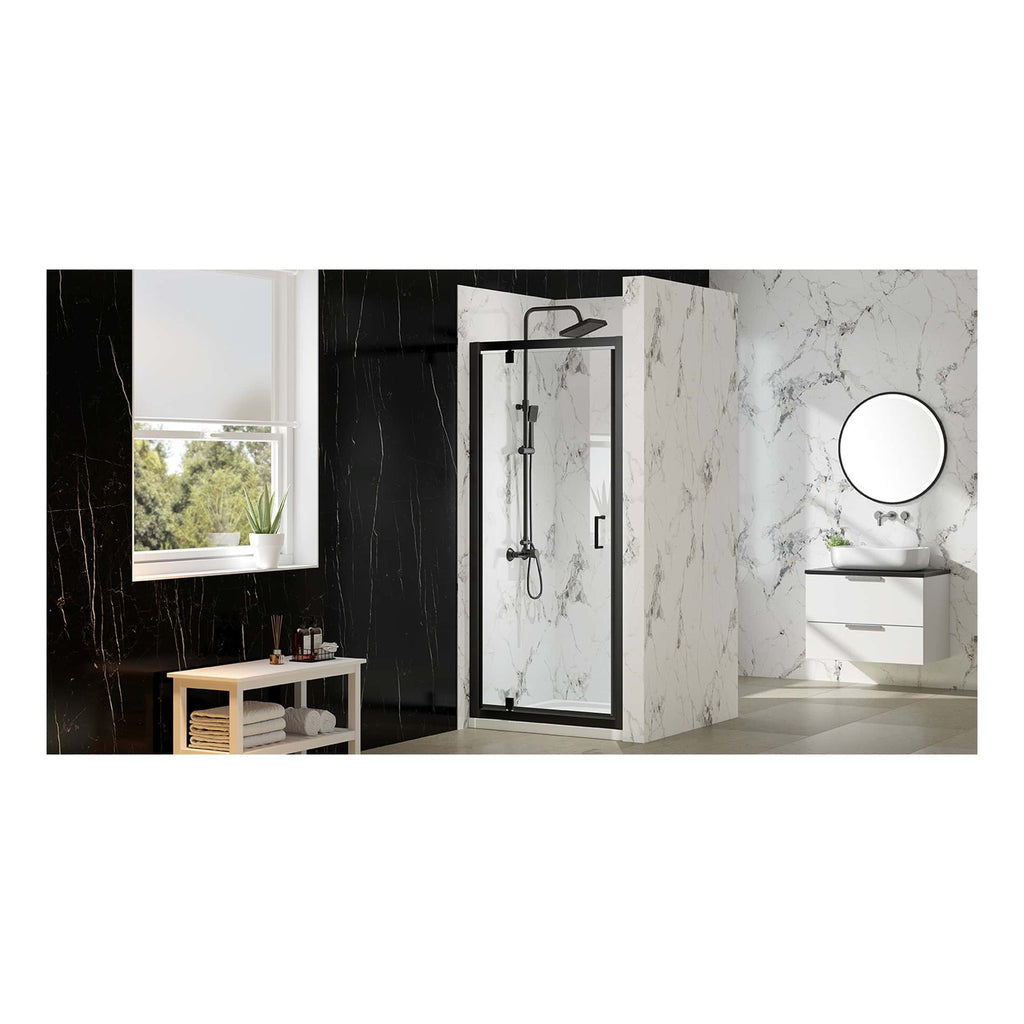 Shower enclosure with black trim and marble effect walls in modern bathroom, featuring a minimalist white vanity and round mirror, ideal for contemporary bubble bathroom designs.
