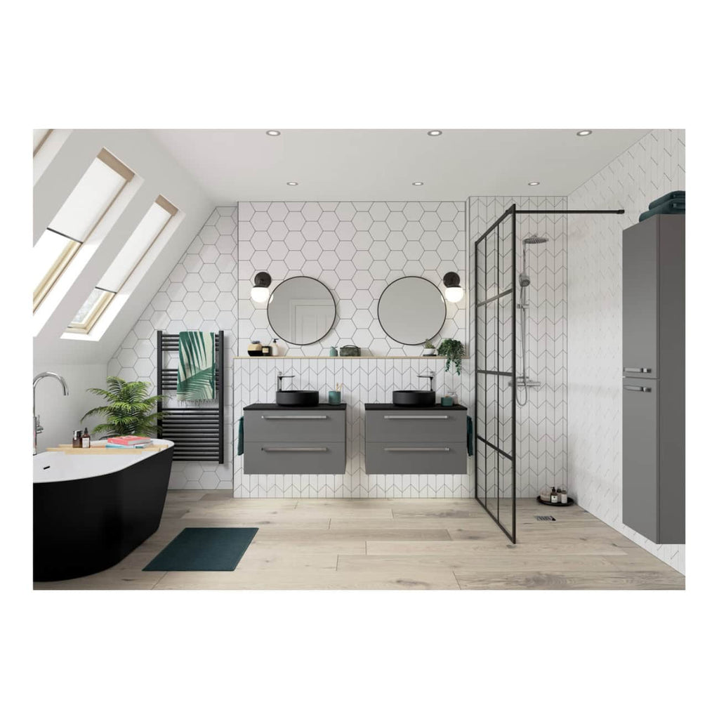Stylish modern bathroom with grey floating vanities, black sinks, a walk-in shower with black frame, and a freestanding bathtub, featuring geometric white tiles, skylight windows, and contemporary accessories.