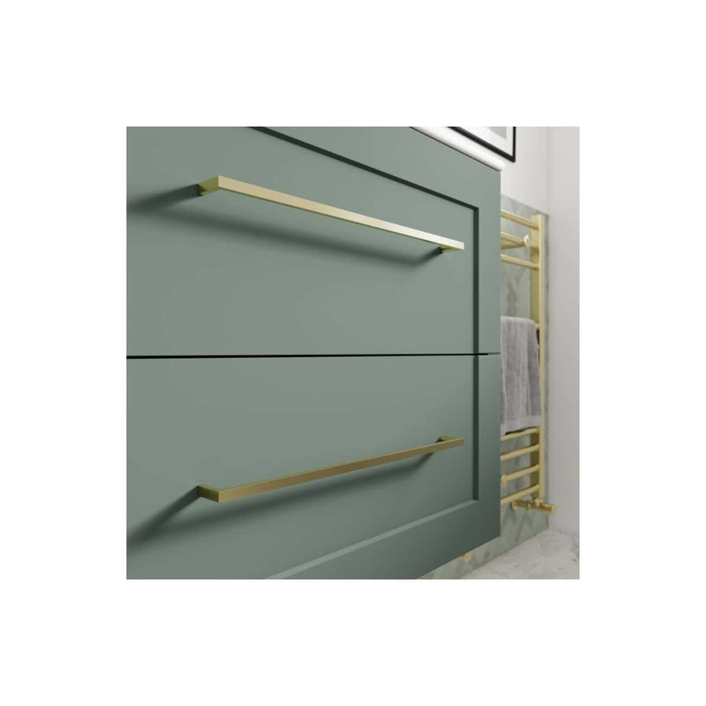 Brass bathroom drawer handles on a modern green vanity unit with gold towel rail in a contemporary bathroom setting.