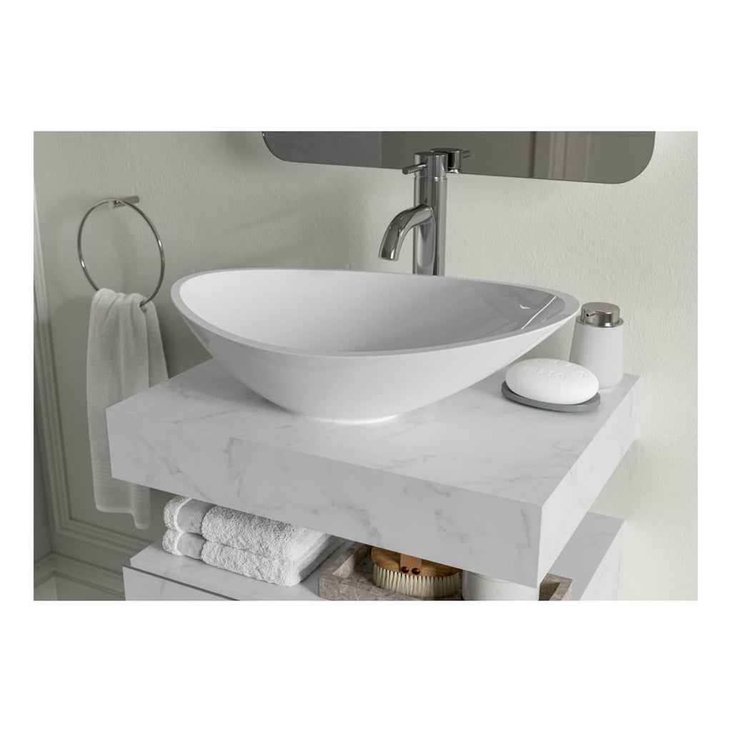 Polished modern bathroom sink with a sleek white vessel design on a marble countertop, complemented by accessories and a clean, minimalist aesthetic.