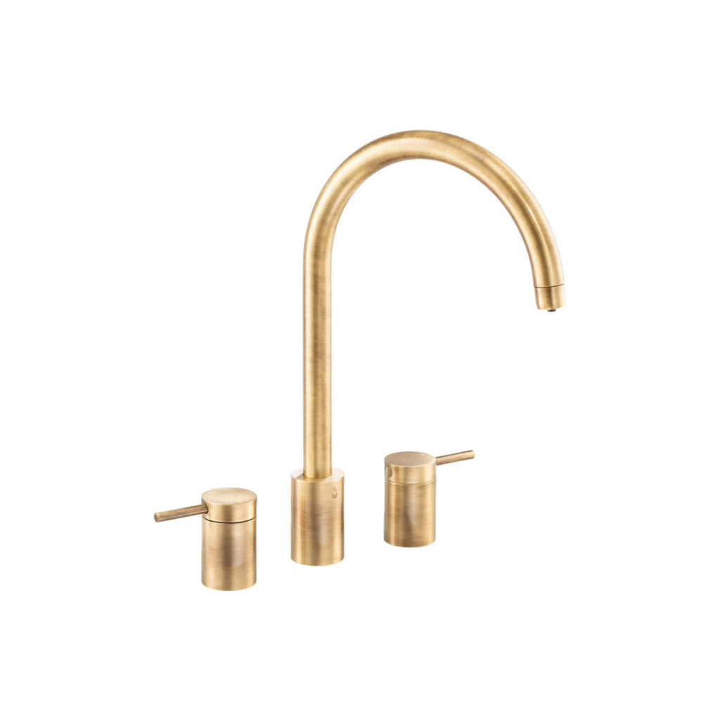 Brass finish kitchen sink tap with dual handles and high arched spout, ideal for contemporary bathroom and kitchen upgrades, offering durability and modern style.