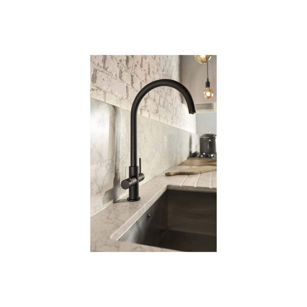 Sleek black kitchen tap with minimalist design, mounted on a marble countertop with a modern backsplash, ideal for contemporary kitchens.