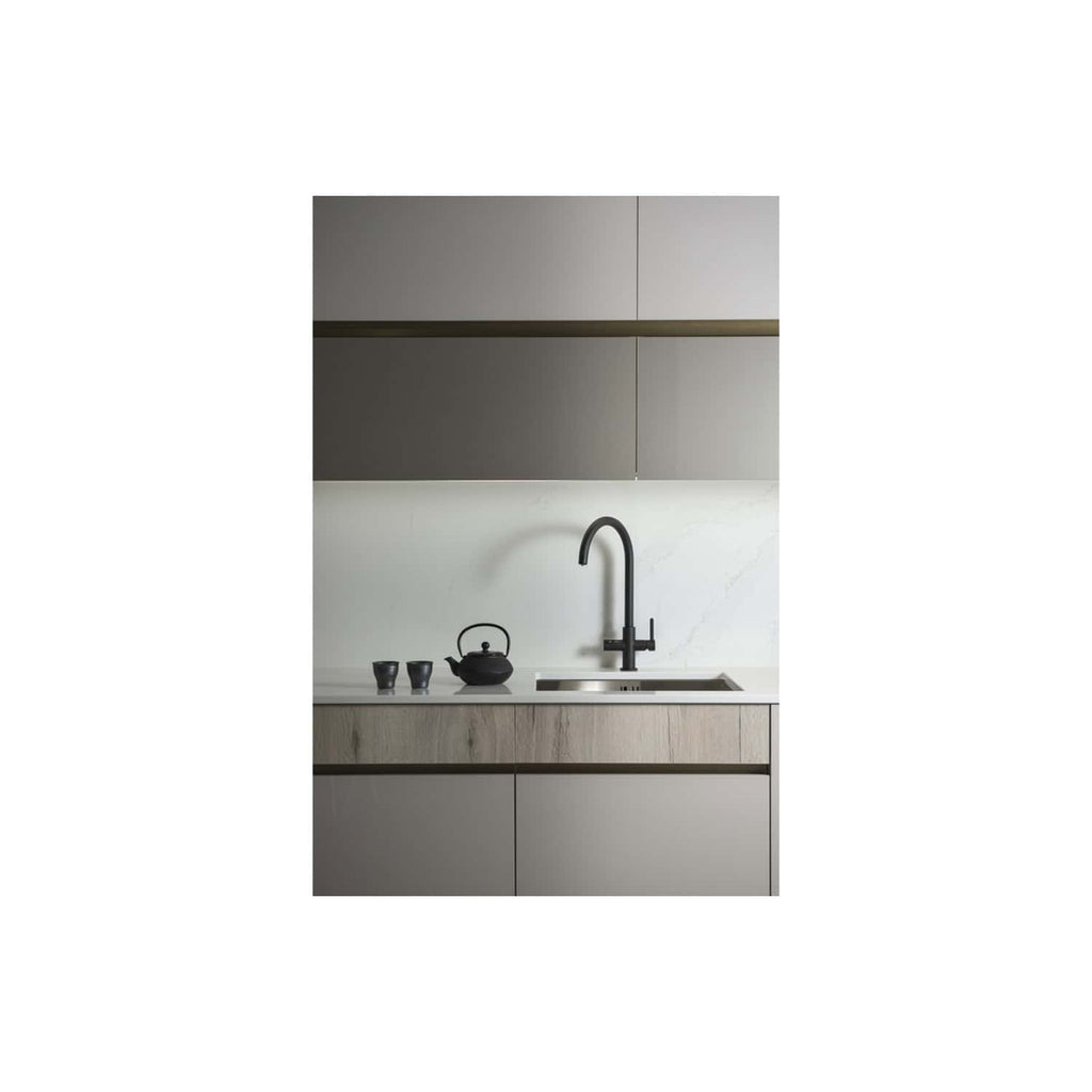 Sleek modern kitchen with minimalist design, matte grey cabinets, and a black matte kitchen tap for contemporary bathroom and kitchen renovations.