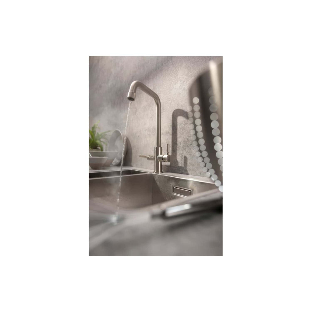 Shiny stainless steel kitchen sink with modern gooseneck faucet in a contemporary bathroom setting. The sink features a sleek design with clean lines, perfect for modern bathroom decor.