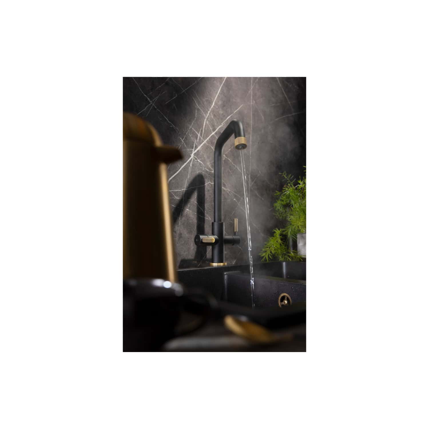 Elegant black matte kitchen tap with gold accents on a dark marble backsplash, featuring a sleek modern design and functional features, ideal for contemporary bathrooms or kitchens.