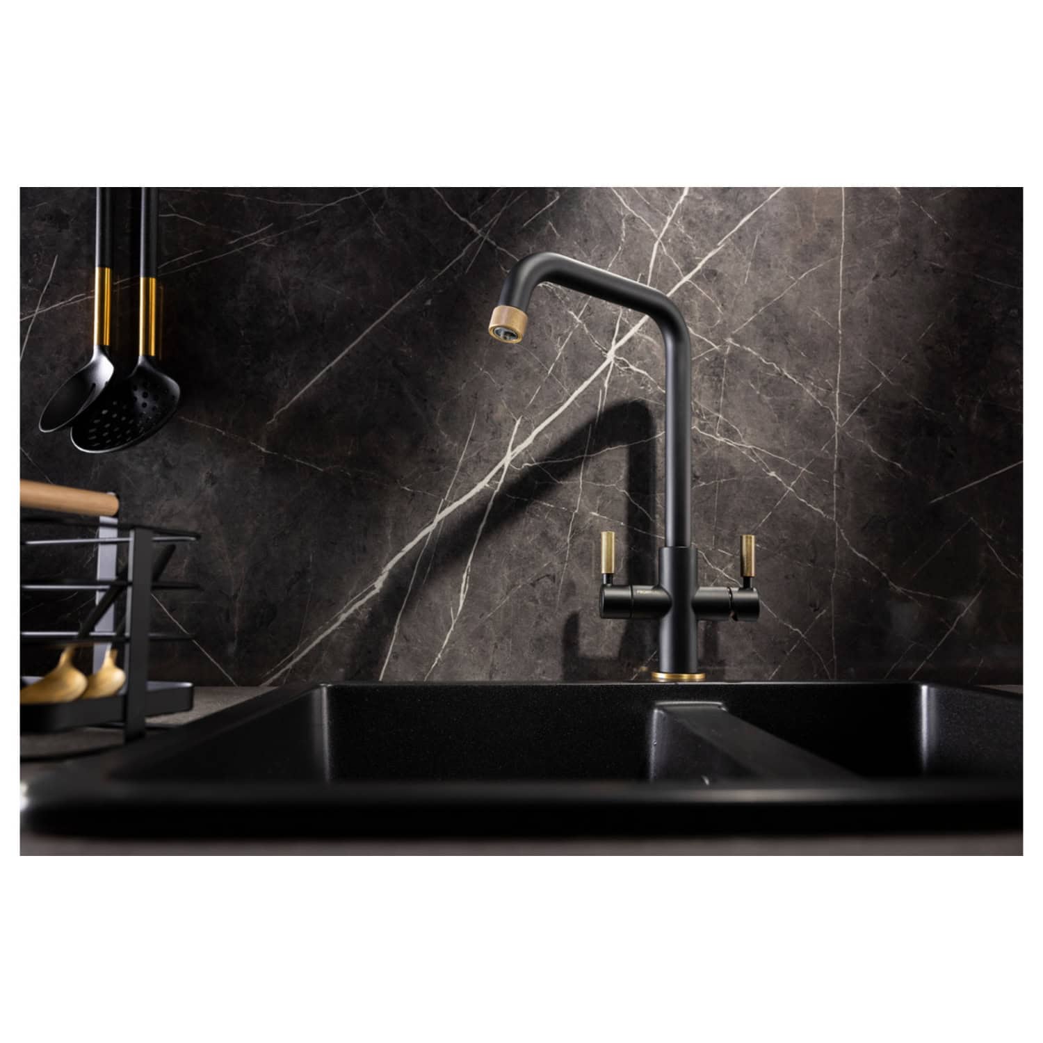 Sleek black kitchen sink with modern matte black and gold faucet, set against luxurious dark marble backsplash, perfect for contemporary bathroom or kitchen decor.