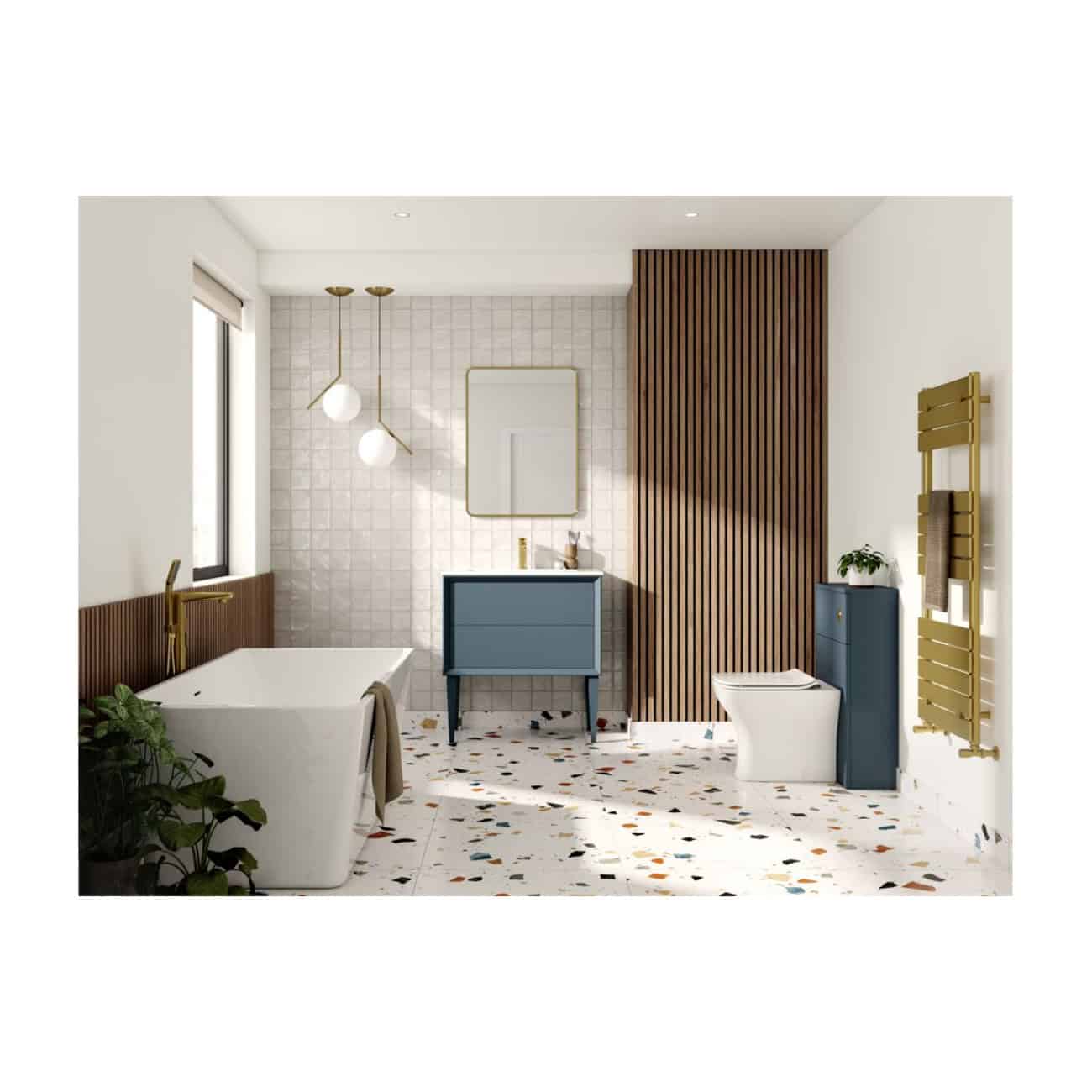 Luxurious modern bathroom design featuring a freestanding bathtub, blue vanity unit, wooden slat wall, gold fixtures, terrazzo flooring, and contemporary lighting, showcasing elegant bathroom renovation ideas.