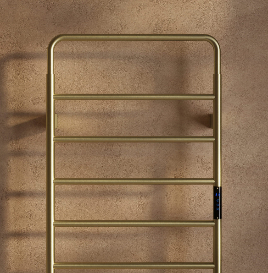 Scudo Aura Electric Towel Rail 1200 x 500mm, Brushed Brass in a bathroom setting