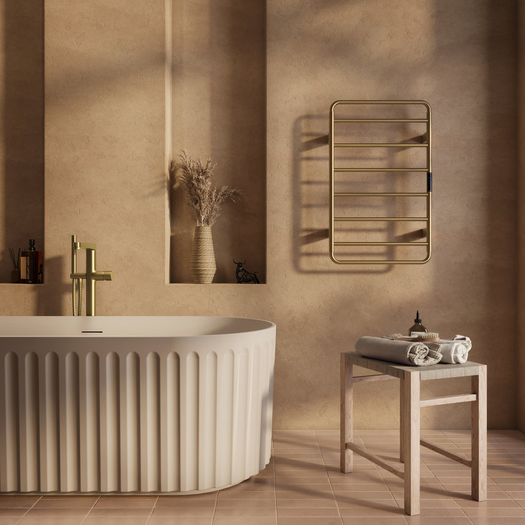 Scudo Aura Electric Towel Rail 800 x 500mm, Brushed Brass in a bathroom setting