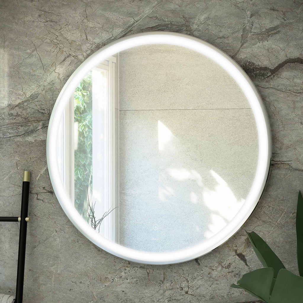 Illuminated round bathroom mirror with LED lighting reflecting a bright window, modern bathroom decor, and natural light. Perfect for contemporary bathroom updates and enhanced daily grooming routines.