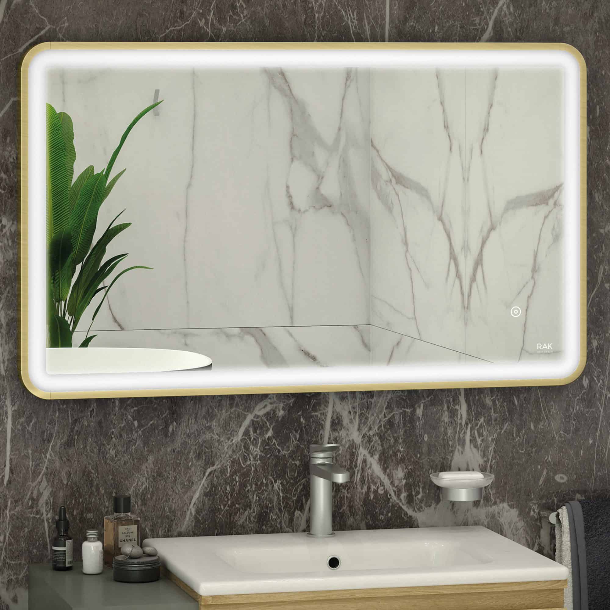 Sleek modern bathroom mirror with LED lighting, marble wall background, and minimalist sink setup, creating a stylish and functional bathroom space.