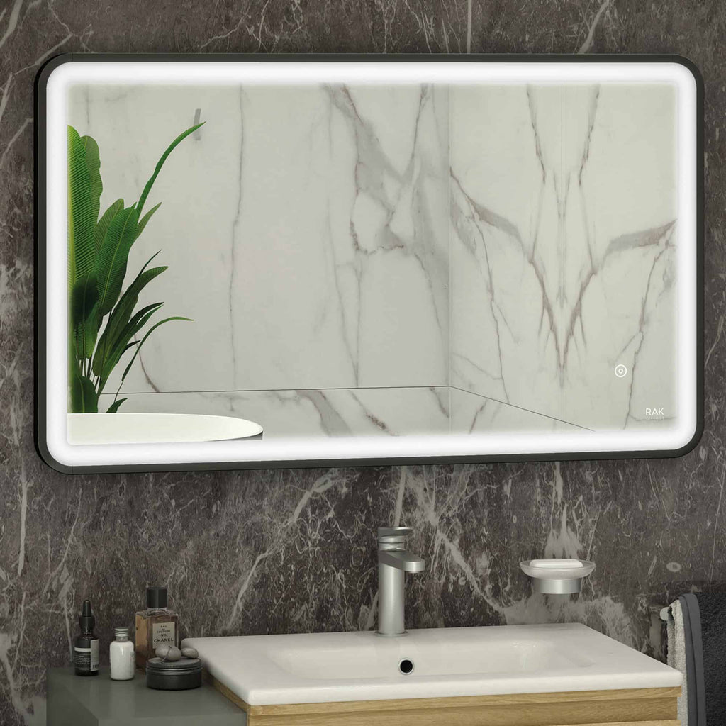Sleek modern bathroom with illuminated LED mirror, white marble vanity, and stylish accessories in a contemporary design. Perfect for luxury bathroom renovations and elegant interior styles.