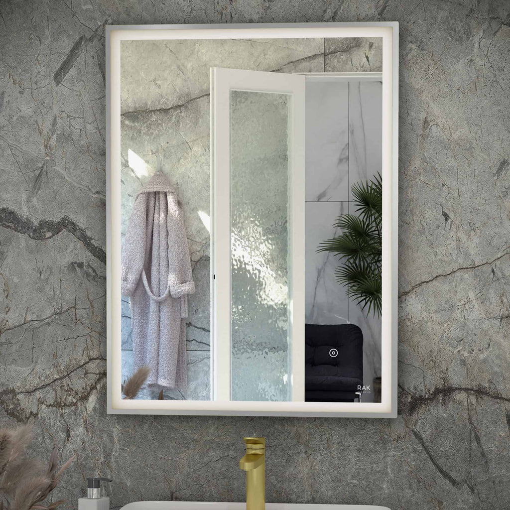 Stylish bathroom mirror with built-in LED lighting, designed to enhance bathroom decor and functionality, perfect for modern Bubly Bathrooms.