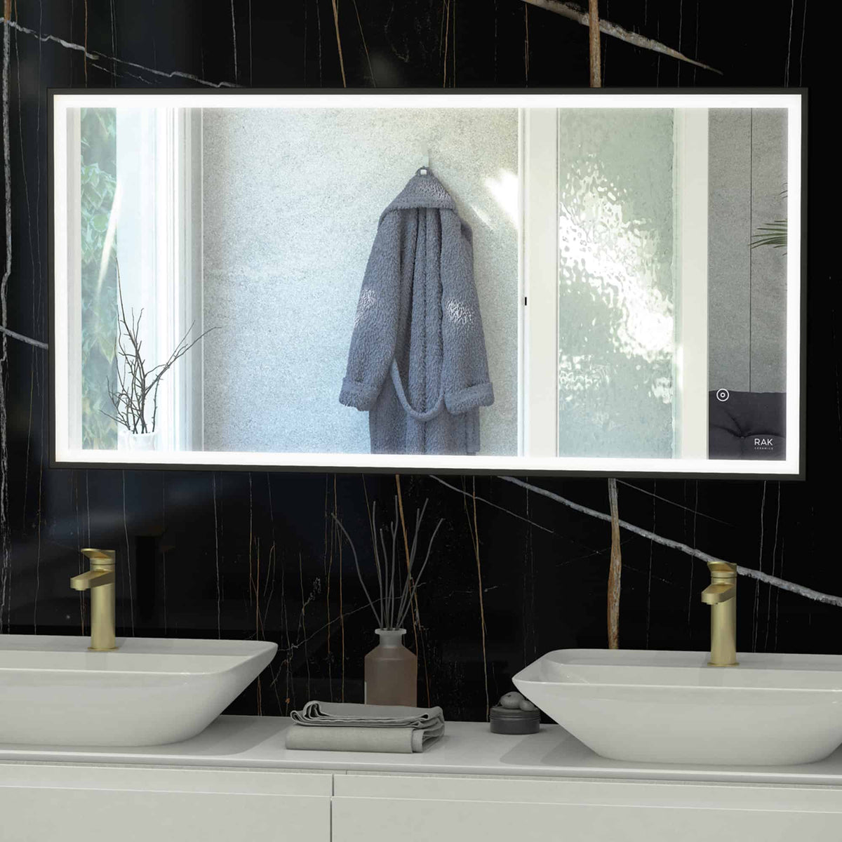 Sleek modern bathroom vanity featuring double vessel sinks, gold faucets, and a large illuminated mirror with black marble walls for a luxurious bathroom upgrade.