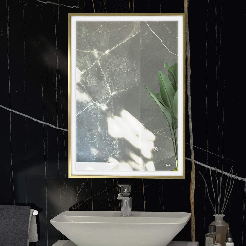 Stylish illuminated bathroom mirror with LED lighting and marble-effect wall tiles, perfect for modern bathroom interiors.