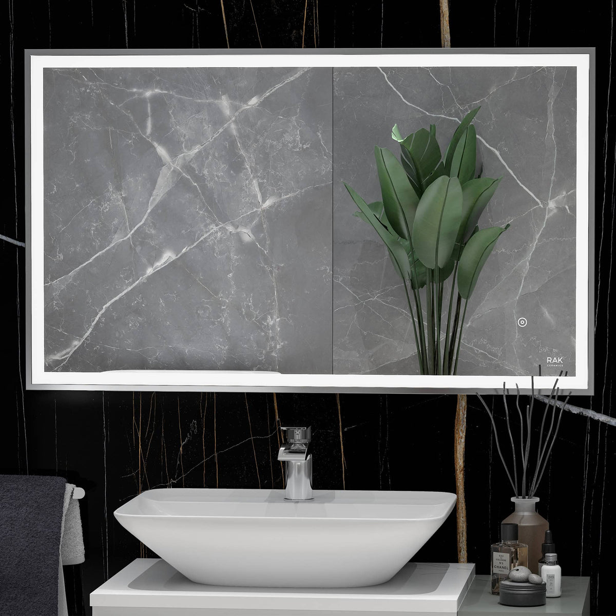 Elegant bathroom with a contemporary marble mirror, white vessel sink, and decorative accessories for modern bathroom decor.