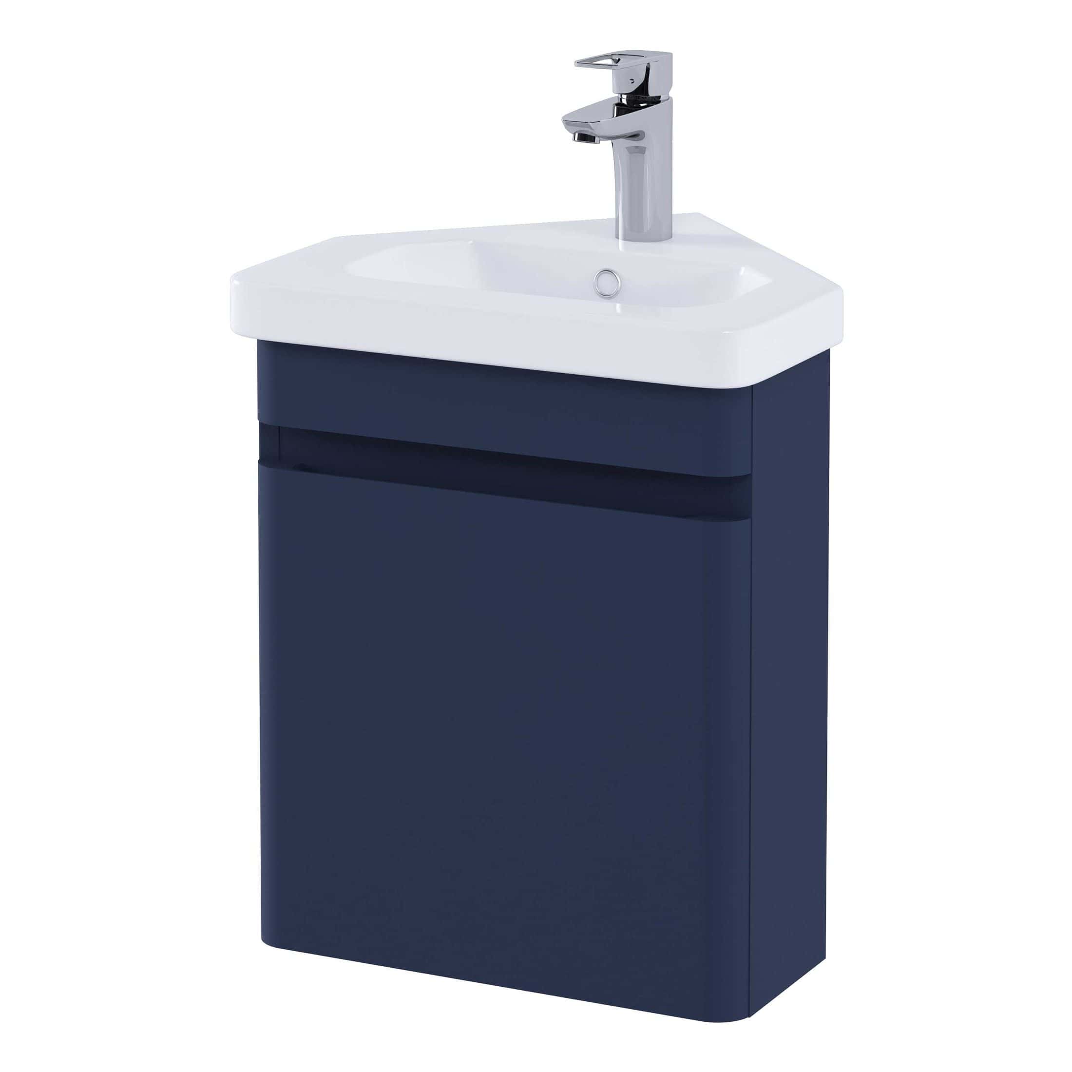 Modern bathroom sink vanity unit with a sleek white basin and navy blue cabinet, ideal for contemporary bathroom interiors. Featuring a single faucet hole and minimalist design.