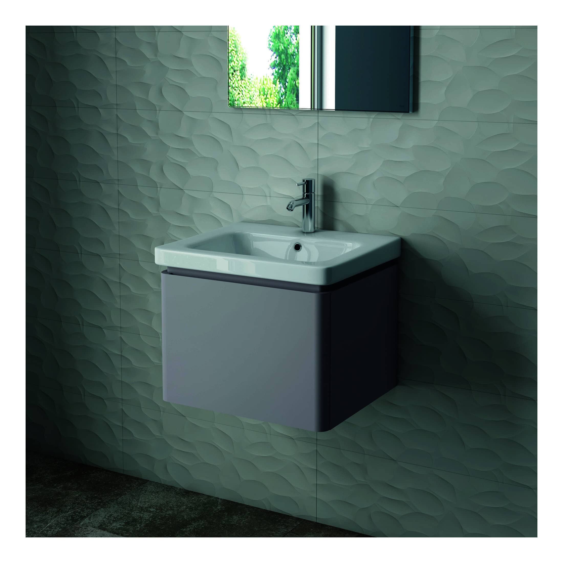 Contemporary bathroom sink vanity with wall-mounted cabinet, chrome faucet, and textured grey wall tiles, ideal for modern bathroom designs.