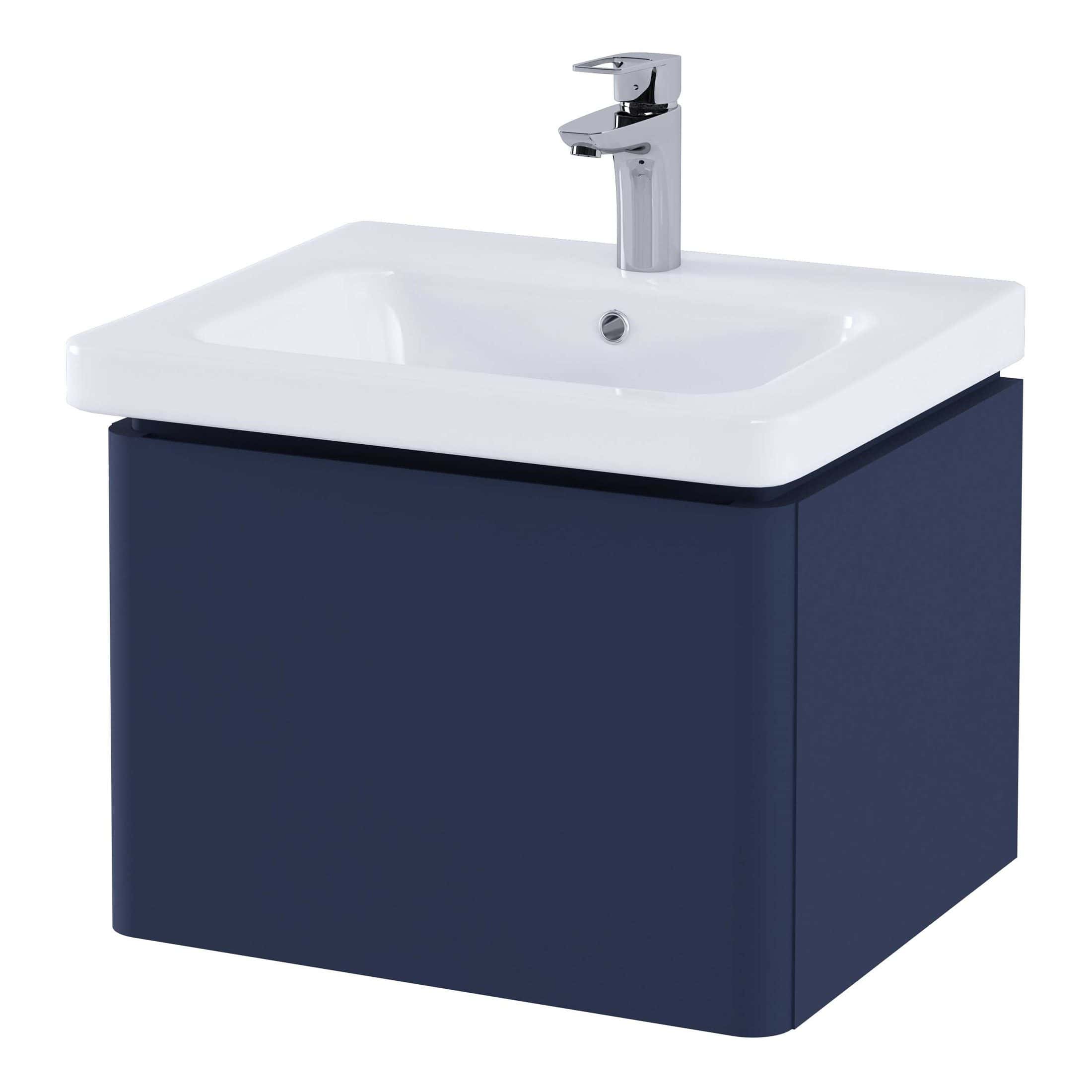 Contemporary bathroom sink vanity with a sleek white ceramic basin and navy blue cabinet base, featuring a modern chrome single-handle mixer tap for stylish bathroom design.