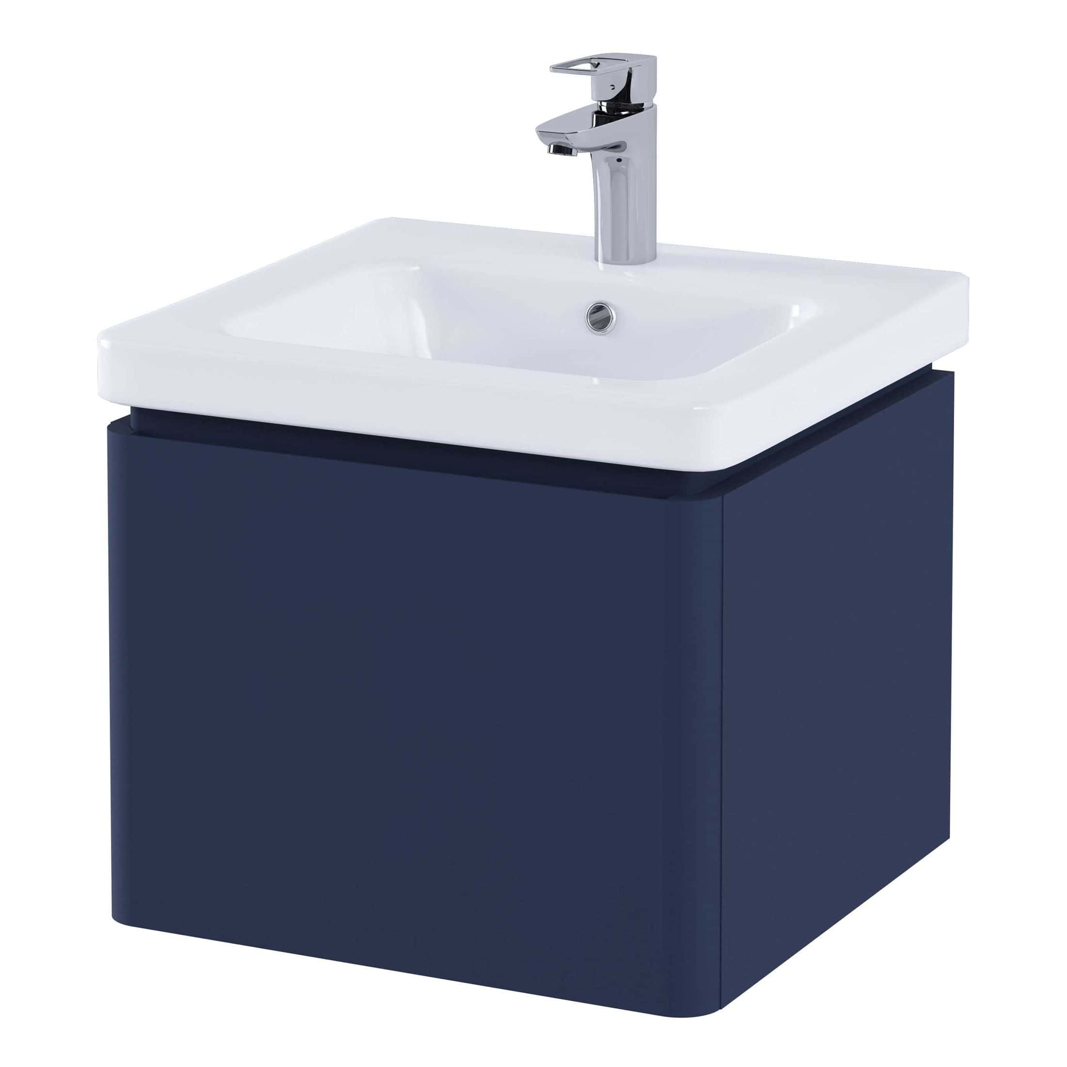 Contemporary bathroom sink with blue cabinet and chrome tap, ideal for modern bathroom decor. Perfect for functional and stylish basin installation. Suitable for residential bathroom renovations.