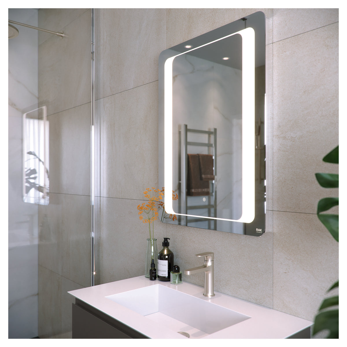 LED illuminated bathroom mirror with sleek modern design, perfect for contemporary bathroom decor and grooming routines.