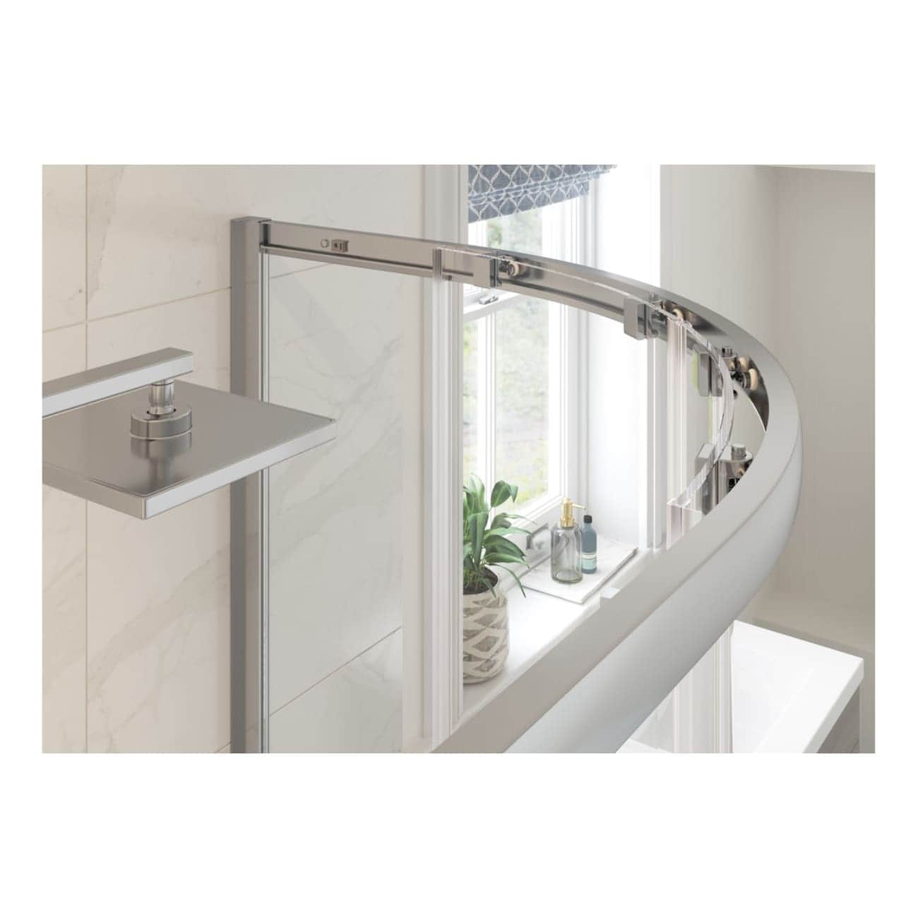 Aluminium shower door with sliding mechanism in modern bathroom setting.