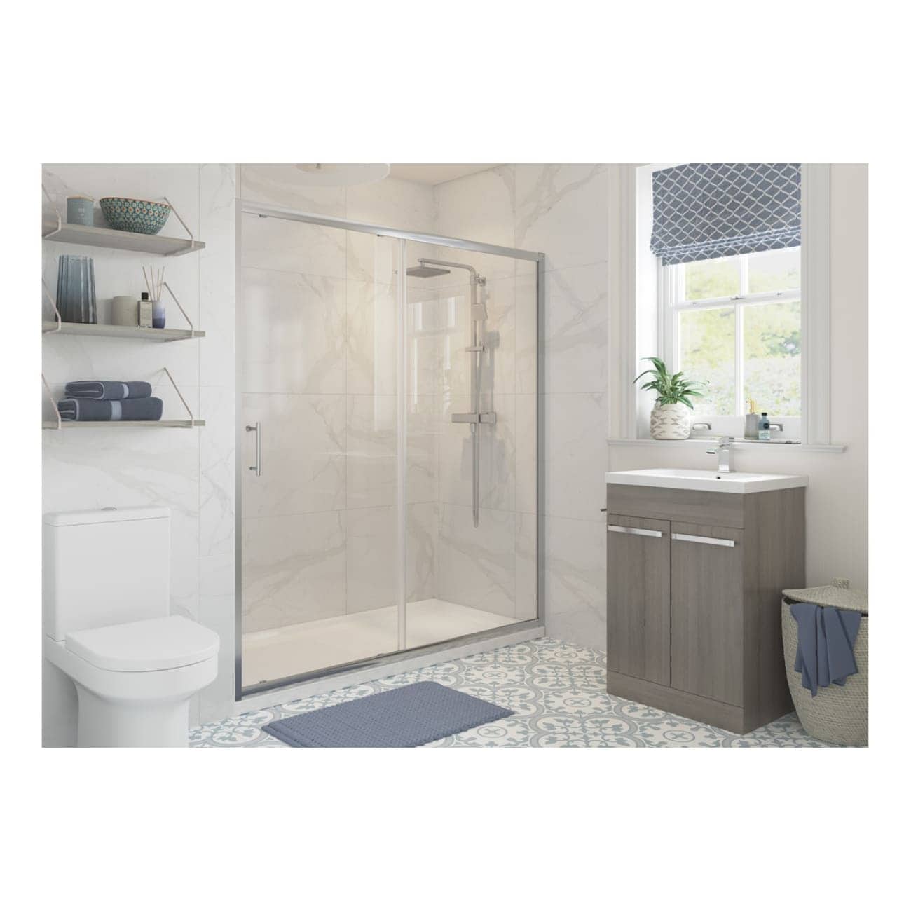 Modern bathroom with a glass shower enclosure, wooden vanity with white sink, patterned blue and white floor tiles, and contemporary decor including towels, plants, and accessories for a stylish bathroom design.