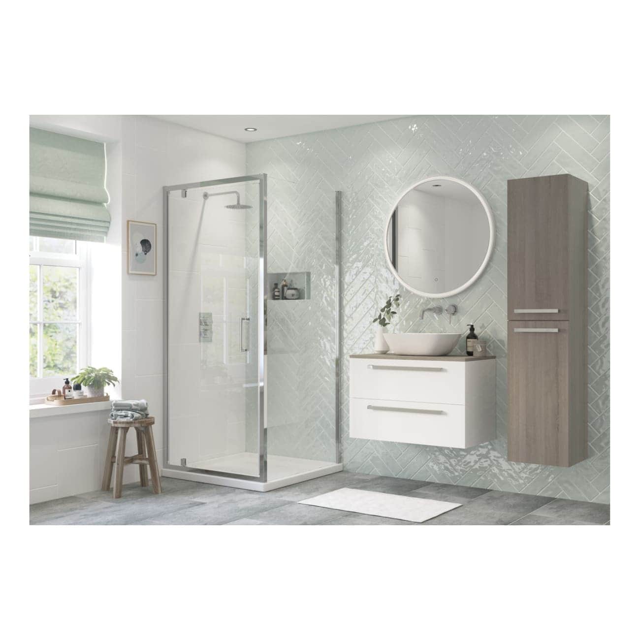 Modern minimalist bathroom with walk-in shower, wall-mounted vanity sink, large round mirror, tall wooden storage cabinet, natural light, and neutral tones for a sleek, contemporary bathroom design.