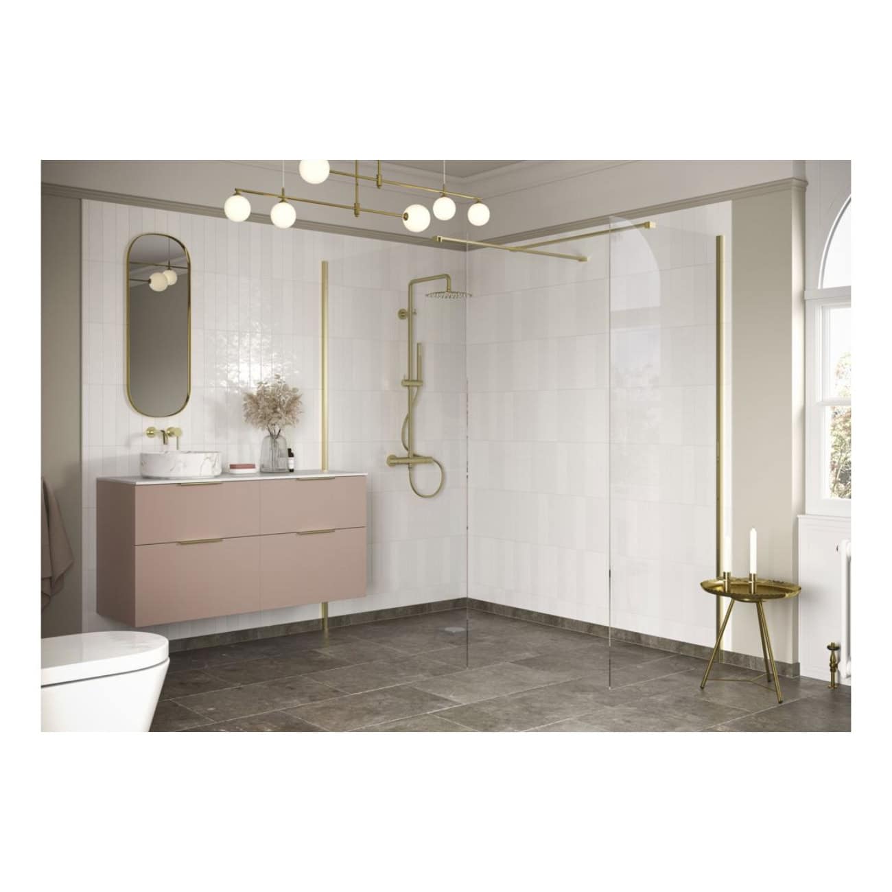 Modern bathroom with a minimalist design, featuring a blush pink floating vanity, white tiled walls, and a spacious walk-in shower with gold fixtures. Elegant lighting and decor create a stylish space.