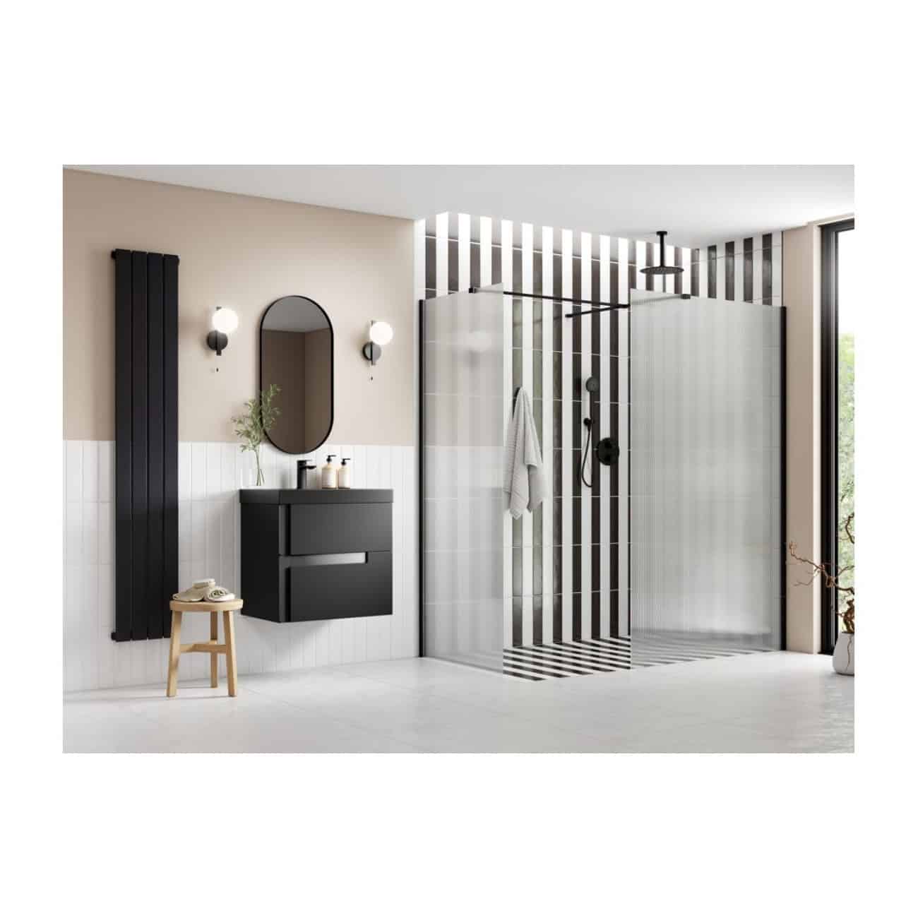 Modern black and white bathroom with walk-in shower, sleek vanity unit, oval mirror, and minimalist design, featuring stylish lighting and contemporary decor from Bubly Bathrooms.