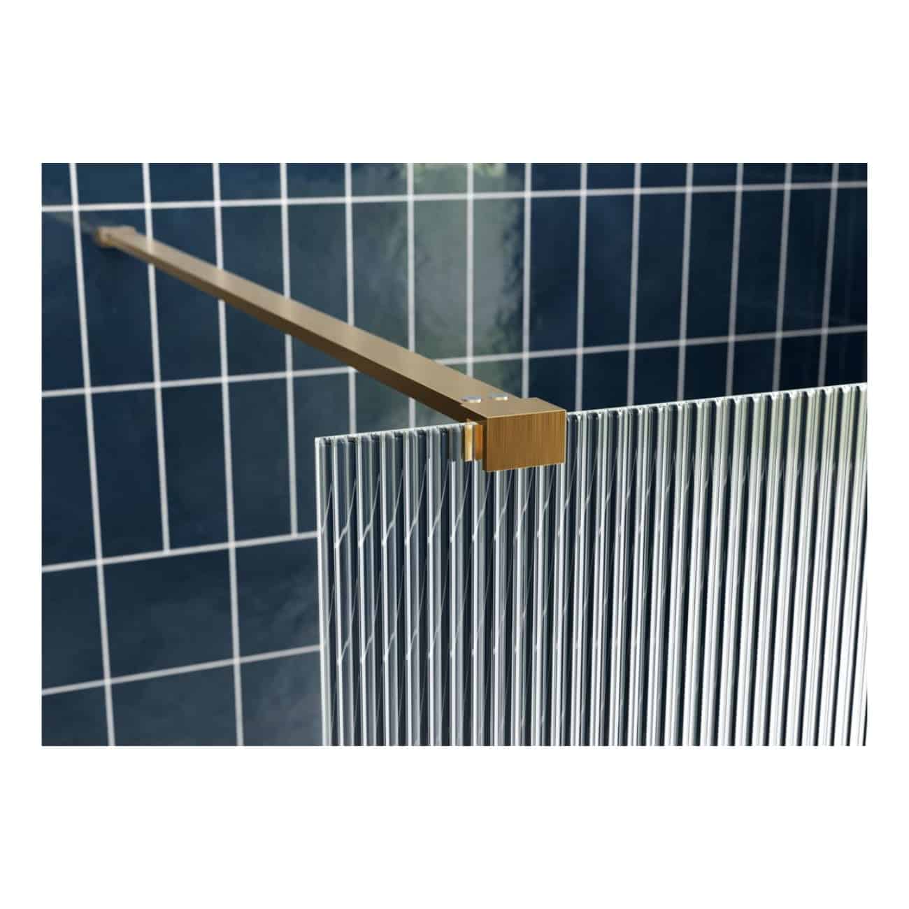 Sleek metal bathroom radiator with vertical bars, mounted on a modern blue tiled wall, blending functionality and contemporary design for a stylish bathroom setting.