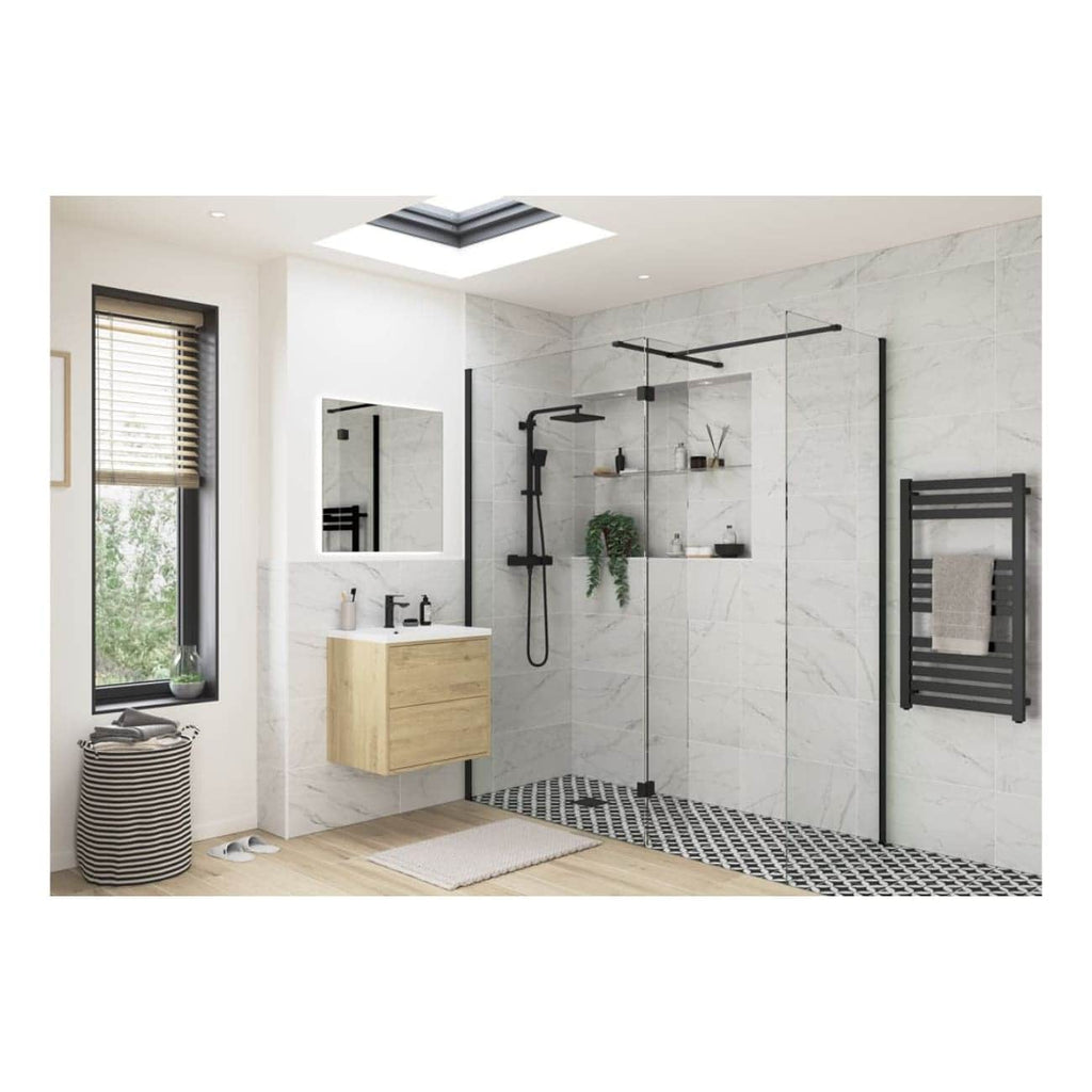 Modern bathroom featuring a sleek walk-in shower with black frame glass enclosure, wall-mounted wooden vanity with black fixtures, black towel radiator, and natural light from large windows.