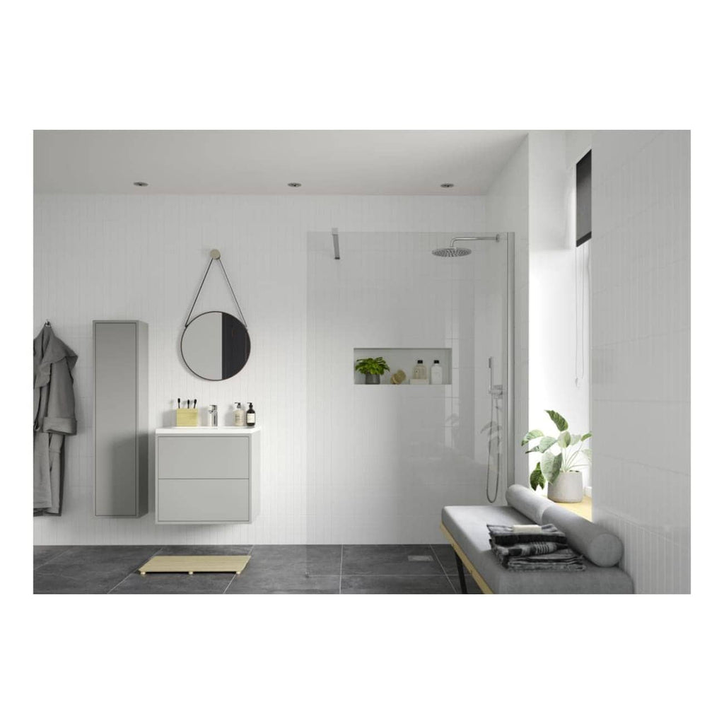 Sleek modern bathroom with walk-in shower featuring a rainfall showerhead, minimalistic vanity with accessories, wall mirror, and a cozy bench with cushions, decorated in a neutral colour palette for a contemporary design.