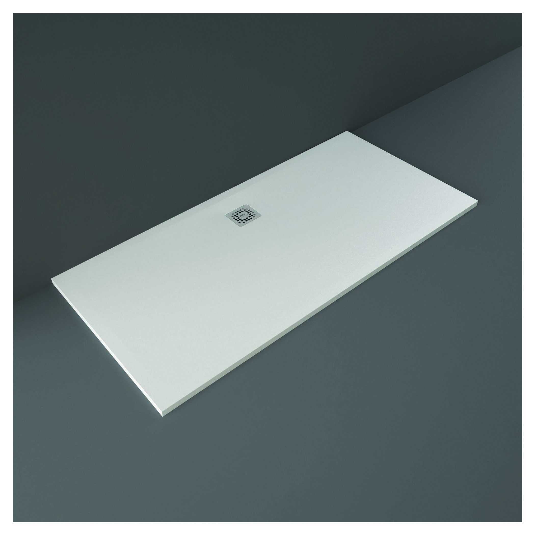 Sleek white rectangular shower tray with anti-slip surface and central drain, ideal for modern bathroom wet rooms and walk-in showers, providing durability and contemporary style.