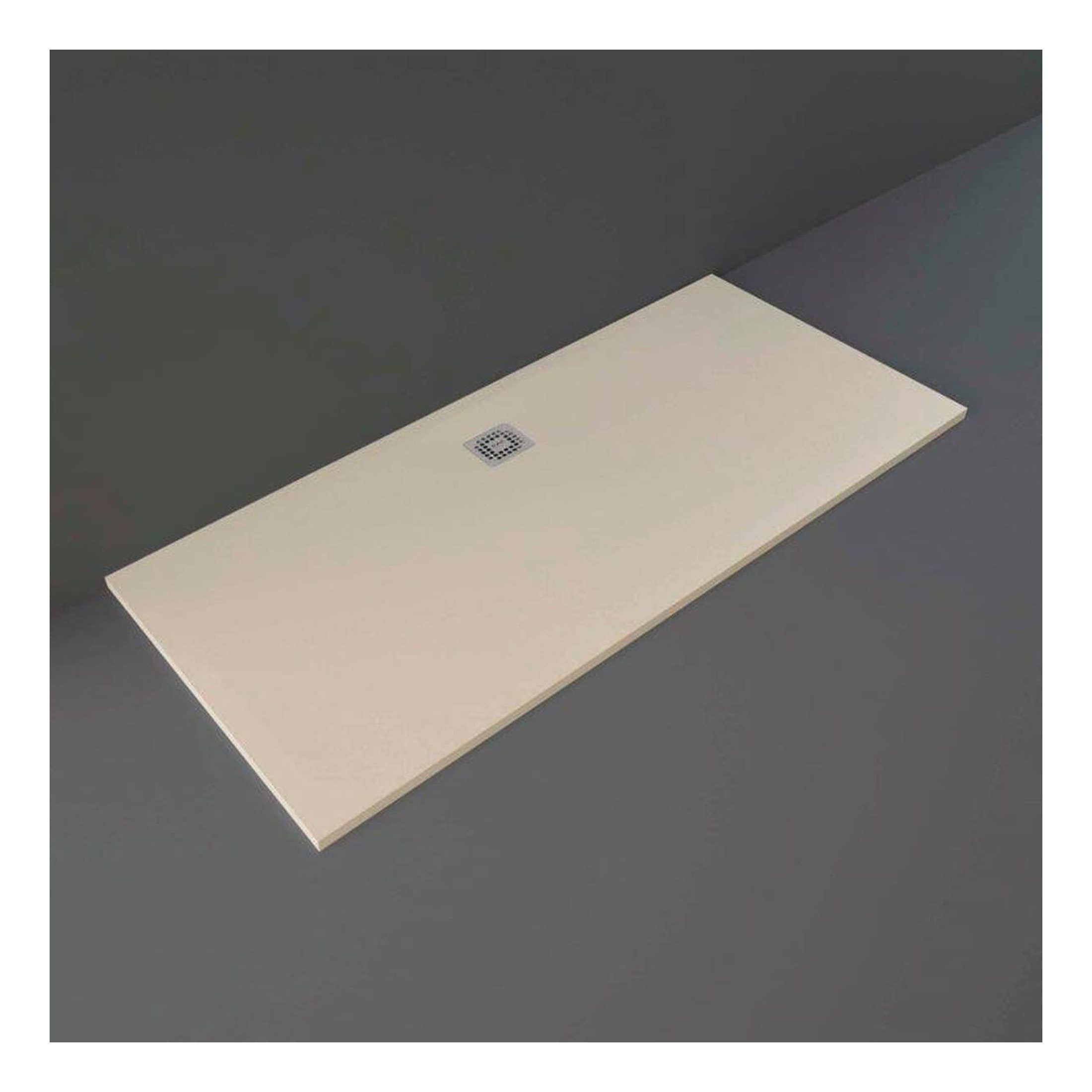 Modern beige walk-in shower tray with central stainless steel drain on grey background.