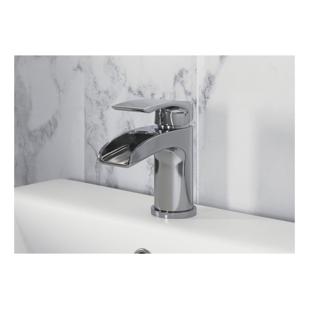 Shiny chrome bathroom tap with a modern design, mounted on a white ceramic sink with a marble tiled wall behind it. Perfect for stylish and functional bathroom upgrades.