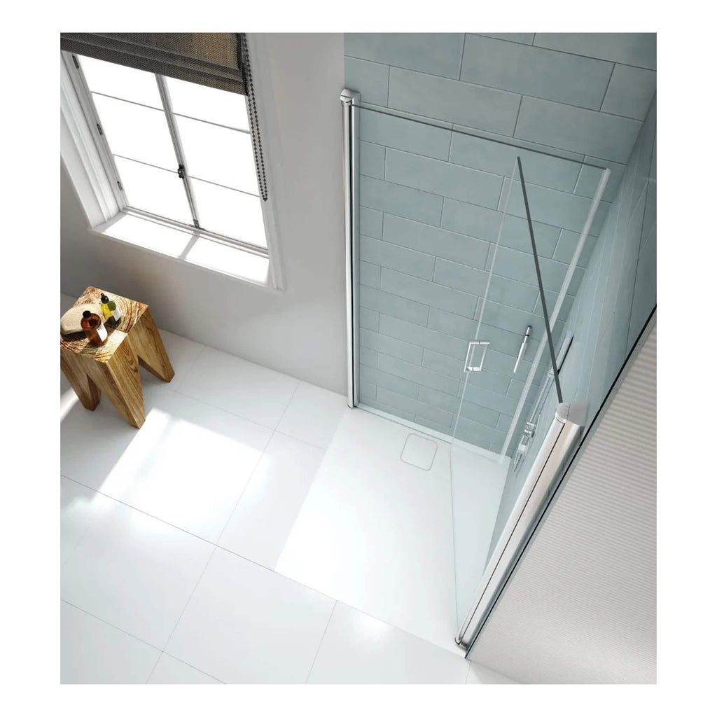 Sleek walk-in shower with glass door and modern tiling, featuring a minimalist design perfect for contemporary bathrooms. Bright natural light highlights the clean, elegant look of the space.