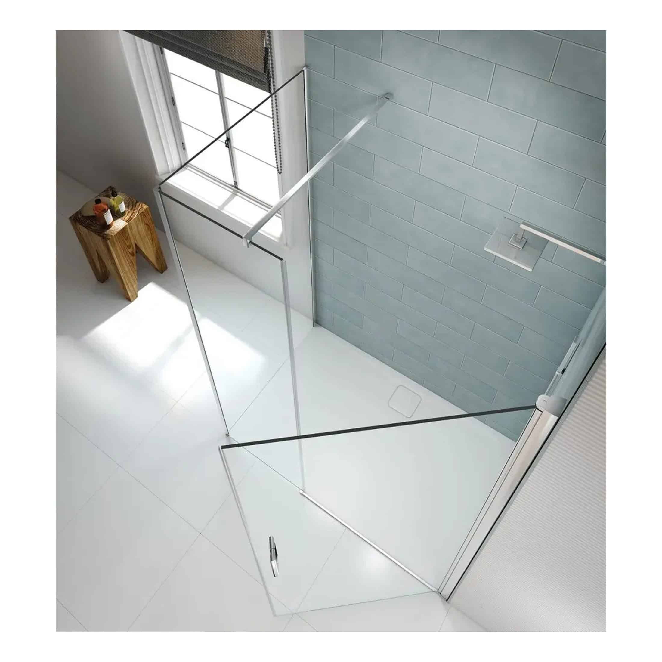 Sleek glass shower enclosure with modern aluminium profiles in a contemporary bathroom setting. Features a clear glass door, minimalist design, and grey tiled wall for a stylish, functional shower space.